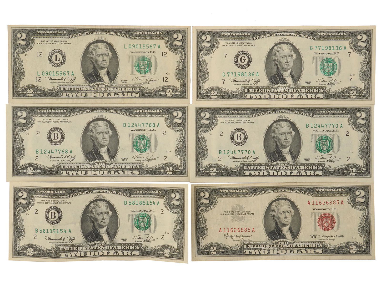 MID CENTURY UNITED STATES TWO DOLLAR BILLS: A lot of six mid-century American two dollars notes with Thomas Jefferson. Series of 1963 standard with a red seal. Series of 1976, Bicentennial standard, five bills, printed with a slight displacemen