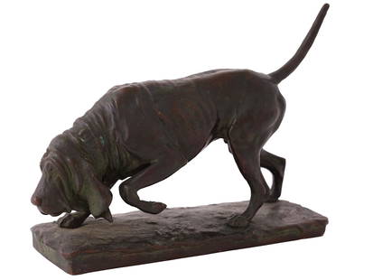 ANTIQUE BRONZE DOG FIGURE BY WILLIAM CLARK NOBLE: An antique patinated bronze figure of a dog by W.C. Noble. Signed by the artist and dated 1905 on the base. Titled Bloodhound on the Scent. Embossed hallmarks A23, 25383 are on the bottom. William Cla