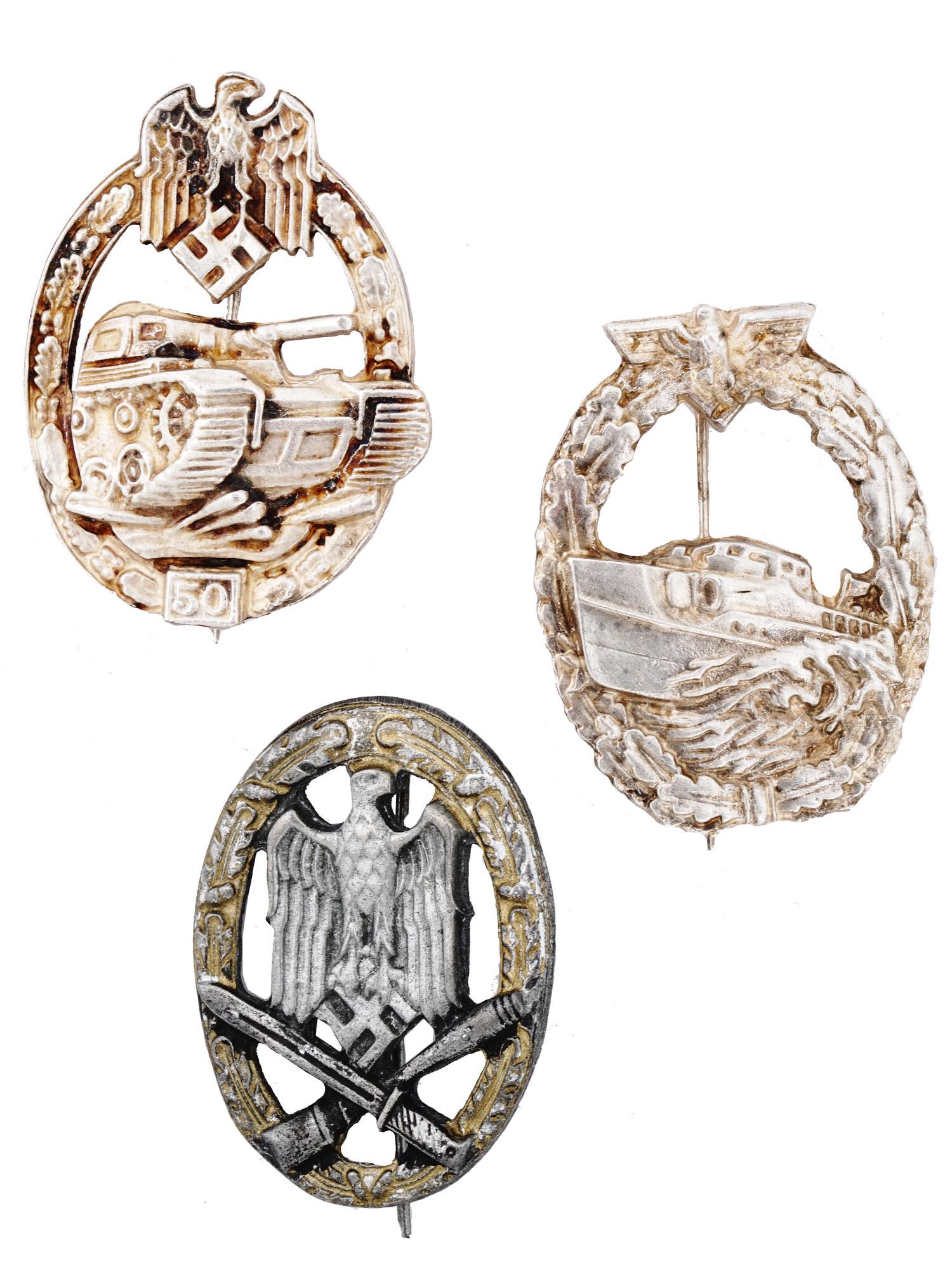 GERMAN WWII GENERAL, TANK ASSAULT, E BOAT BADGES: Three Nazi German WWII military badges including a general assault badge, a Panzer tank assault badge, 50 engagements, and a Kriegsmarine E boat badge. Each has a vertical pinback, a barrel hinge, and