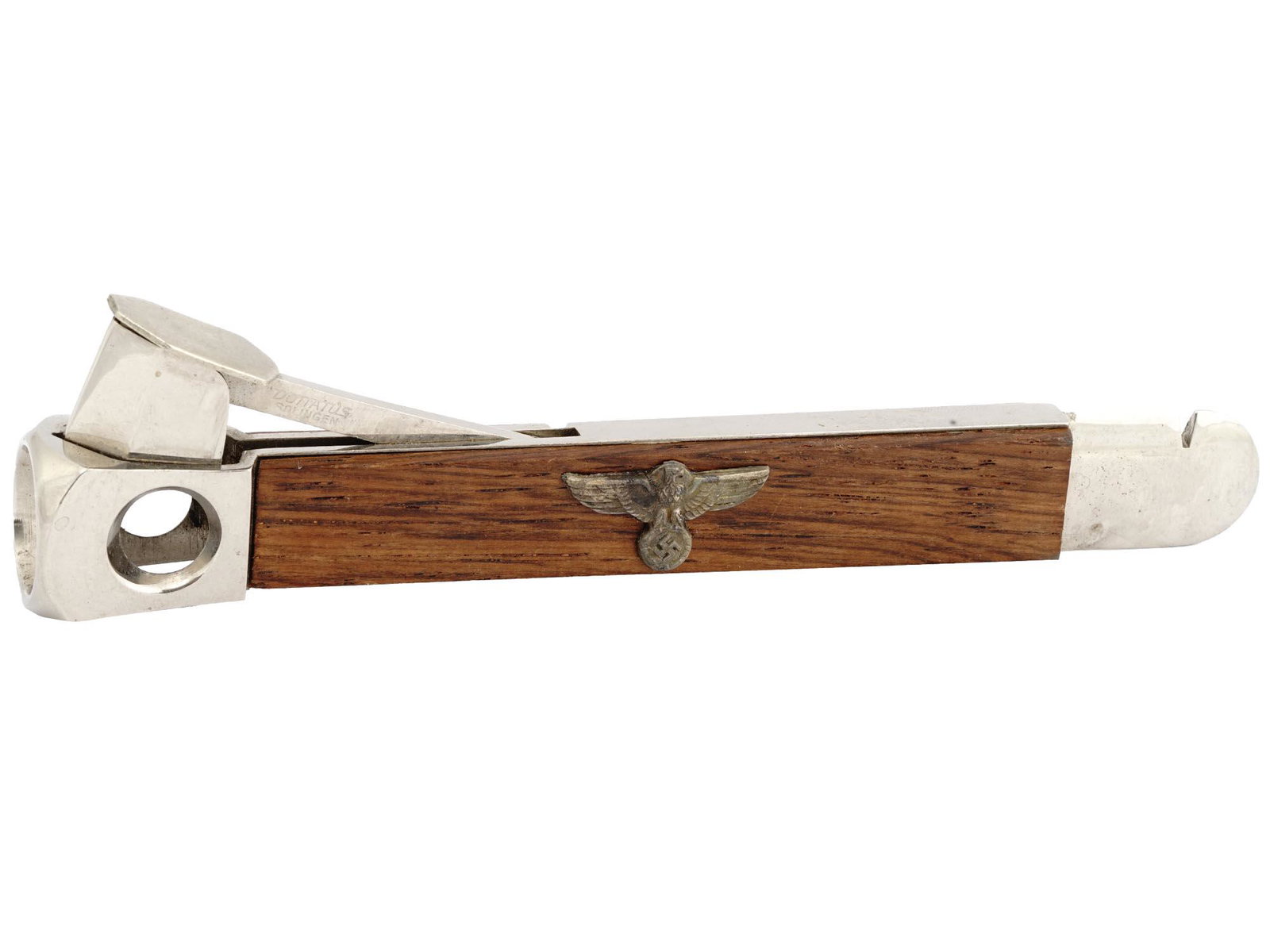 WWII GERMAN NAZI DONATUS SOLINGEN CIGAR CUTTER: A WWII Nazi German Third Reich wooden and stainless steel cigar cutter. The cigar cutter is adorned with a gilt metal eagle swastika insignia plaque. Marked, Donatus Solingen, on the blade. WWII Era N