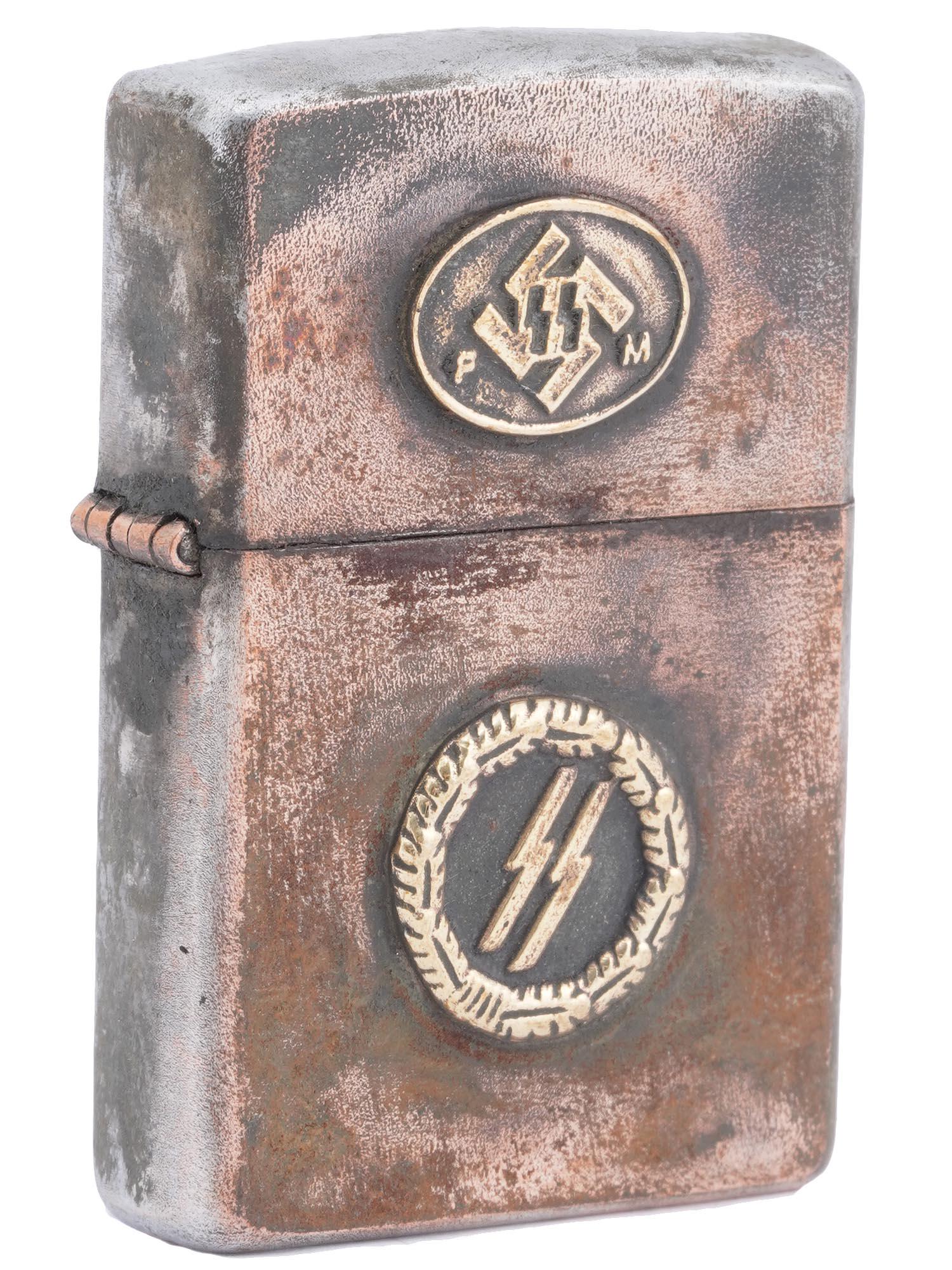 WWII NAZI GERMAN WFFEN SS ZIPPO CIGARETTE LIGHTER: A WWII Nazi German metal gas lighter. Gilt relief SS emblems decorate the case and the lid, and an engraved eagle with a swastika is on the backside of the case. Hallmark RZM is on the bottom. The Sch