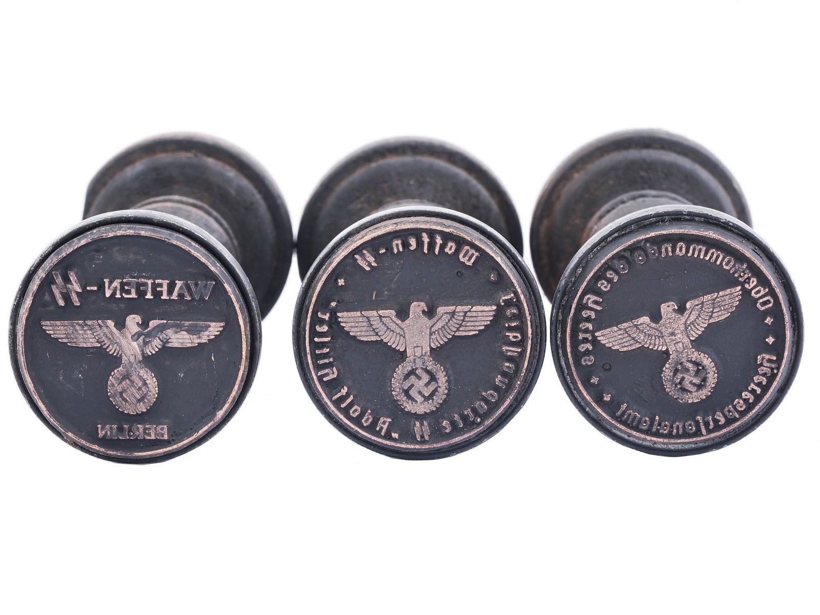 WWII NAZI GERMAN WAFFEN SS INK HAND STAMPS: A set of three WWII Nazi German Waffen SS wood and metal ink hand stamps including a stamp for the 1st SS Panzer Division Leibstandarte SS Adolf Hitler, the second is for Oberkommando des Heeres Heere