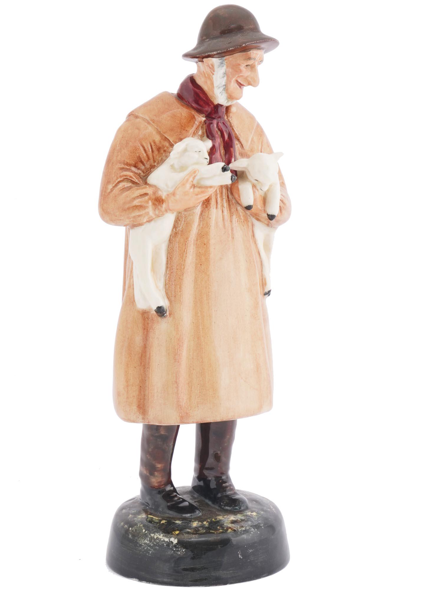 ENGLISH ROYAL DOULTON LAMBING PORCELAIN FIGURINE: An English, British, Royal Doulton glazed hand painted porcelain figurine, Lambing Time. The figurine depicts a man holding lambs. Marked with green ink factory marks, HN 1890, on the bottom. Royal Do