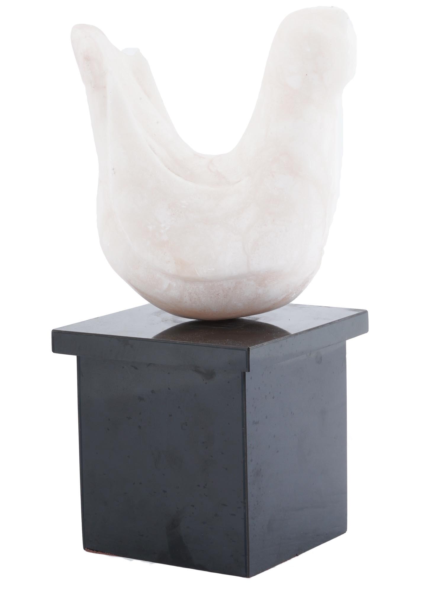 MID CENTURY O. OLSSON CARVED ALABASTER SCULPTURE: A hand carved pink alabaster sculpture depicting an abstract bird figurine resting on a lacquered wood pedestal. The sculpture is signed by O.A. Olsson. Mid Century Modern Decorative Objects, Room Acc