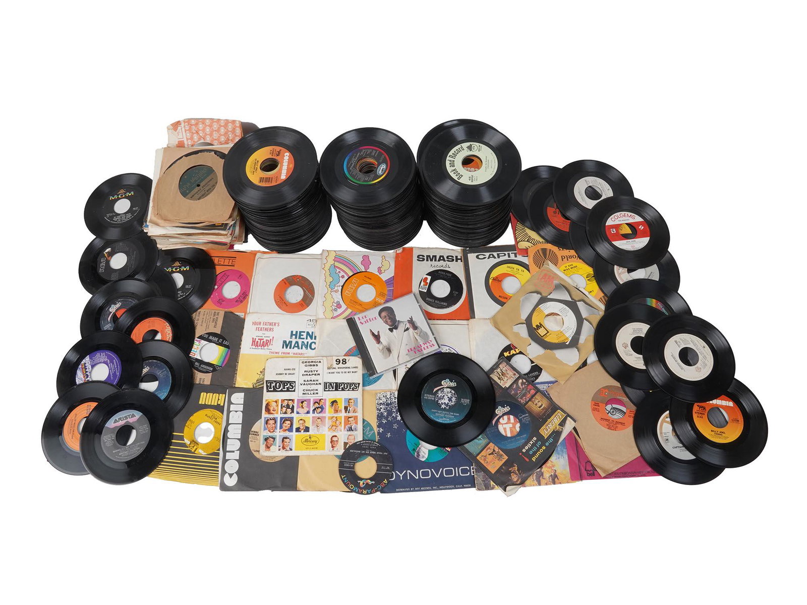 VINTAGE AMERICAN BRITISH POP MUSIC VINYL RECORDS: A large collection of vintage LPs, mainly American and British pop music including the albums by Michale Jackson, Frank Sinatra, Madonna, Duran Duran, and more. Mostly, without covers. Dimensions: Ave