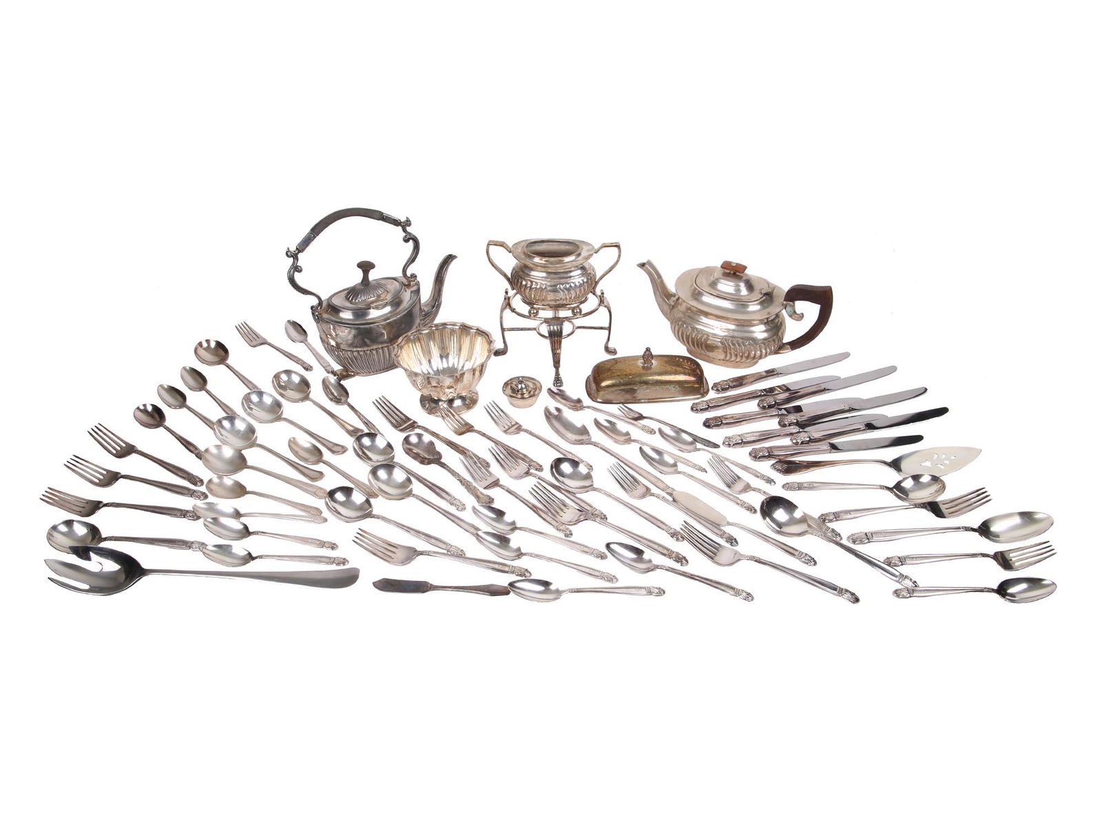 LARGE COLLECTION VINTAGE SILVER PLATED TABLE WARE: A large collection of various vintage silver plated table ware. The collection includes an Eclectic style sugar bowl on a stand with three legs; a pair of antique Victorian era English tea kettles ado