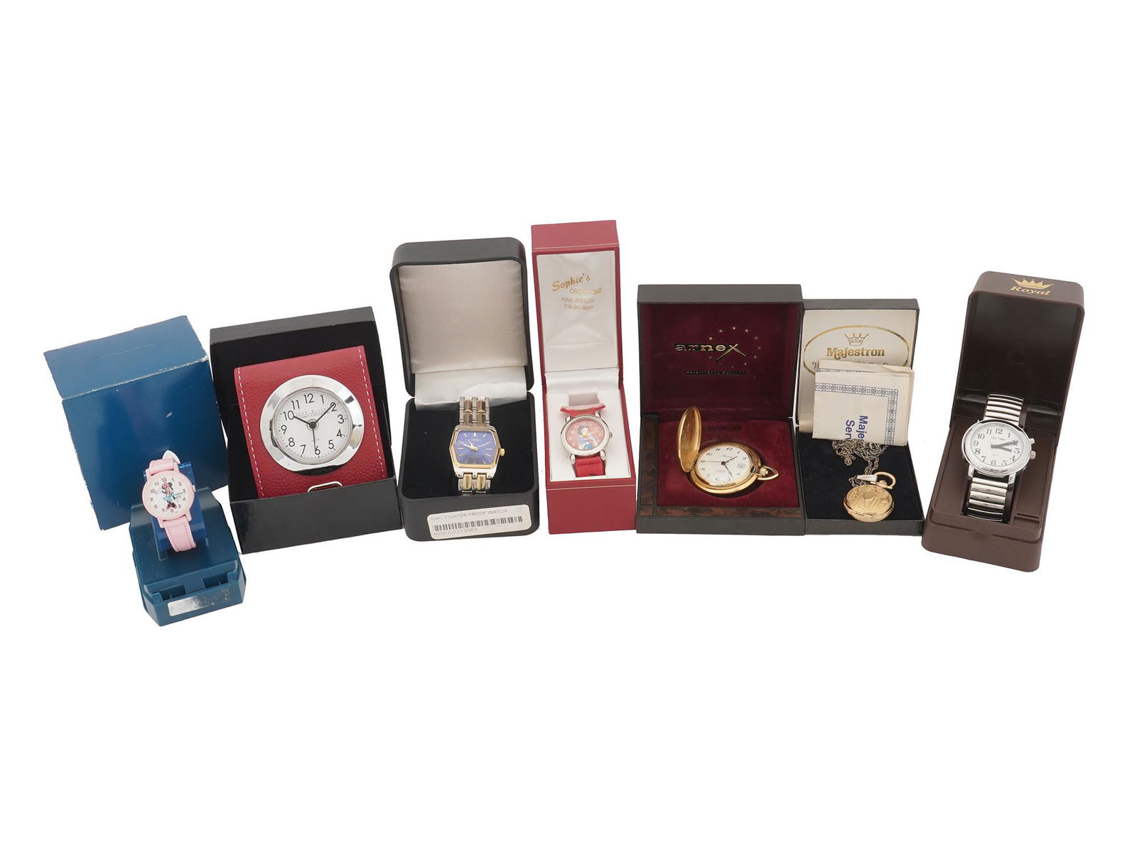 POCKET AND WRIST WATCHES BY ARNEX MAJESTRON IOB: A lot of seven vintage watches. All items come in original boxes. Gold-toned pocket watches by Arnex and Majestron. A Joan Rivers travel clock in red leather case. Wristwatches with link bracelets by