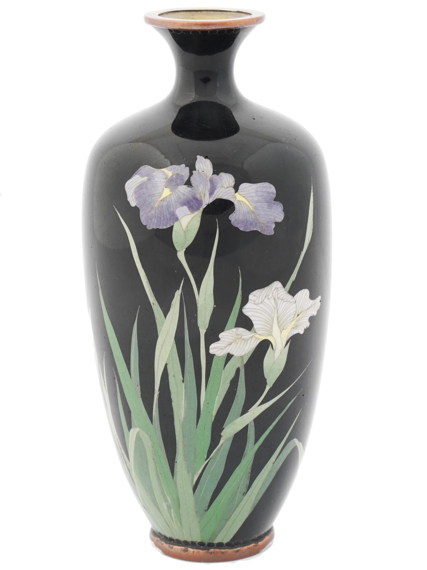 ANTIQUE MEIJI ERA JAPANESE CLOISONNE ENAMEL VASE: An antique Japanese decorative vase, cast of brass with a baluster shaped body and short narrow neck. The surface is decorated with a pictorious scene made using the cloisonne enamel technique and dep