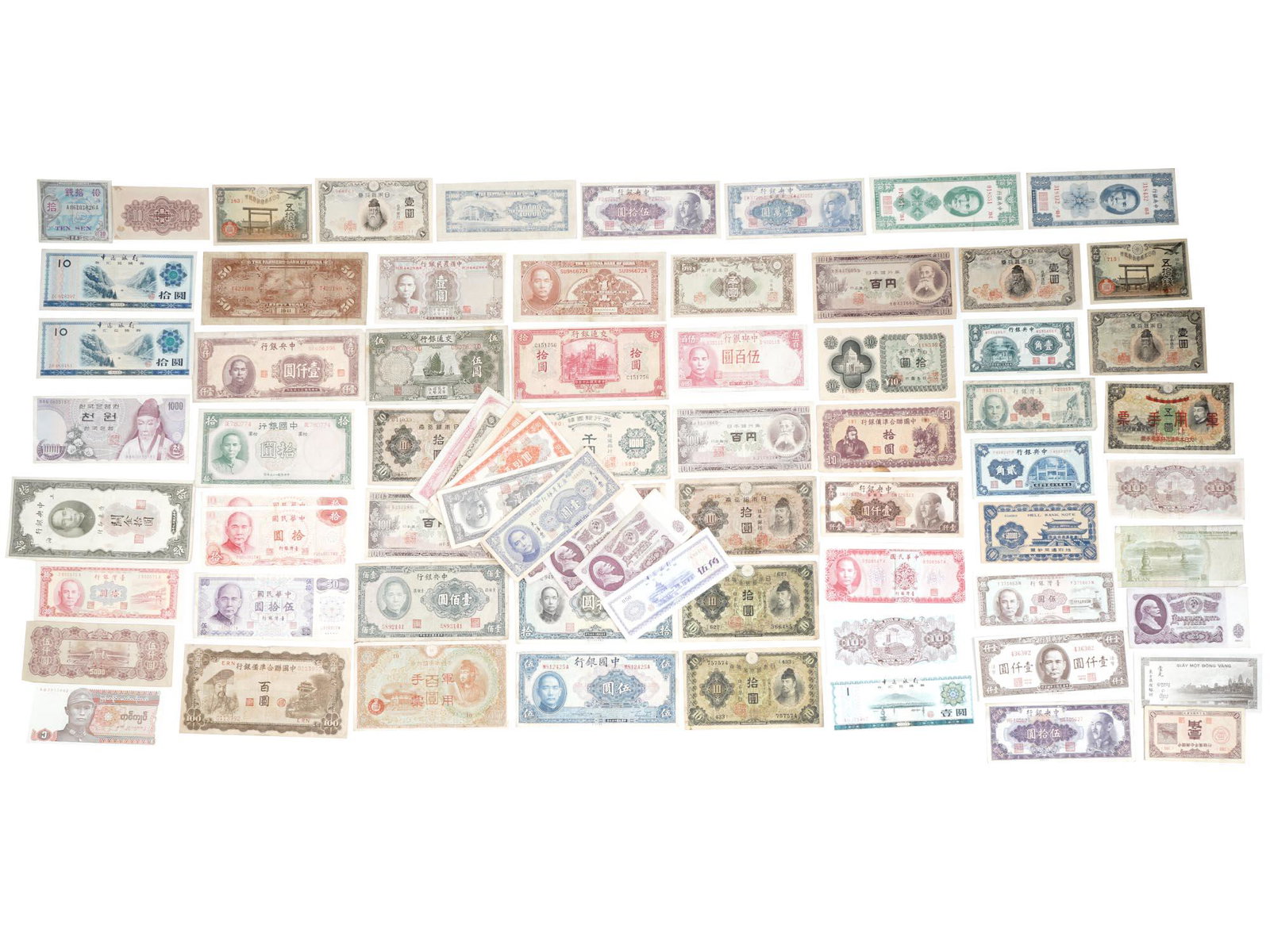 ANTIQUE AND VINTAGE ASIAN CHINESE MONEY BANKNOTES: A huge collection of antique and vintage paper money banknotes, mostly Chinese and Japanese banknotes from the 20th century, the Taisho and Showa eras. Antique And Vintage Chinese Japanese Paper Money