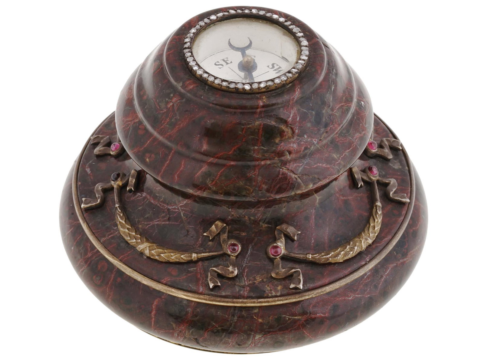 RUSSIAN SILVER RHODONITE RUBIES DIAMONDS COMPASS: A very fine quality Russian desk compass featuring a natural rhodonit body with gilded silver Empire mounts representing laurel wreaths set with ruby cabochons. The face of the compass is surrounded b