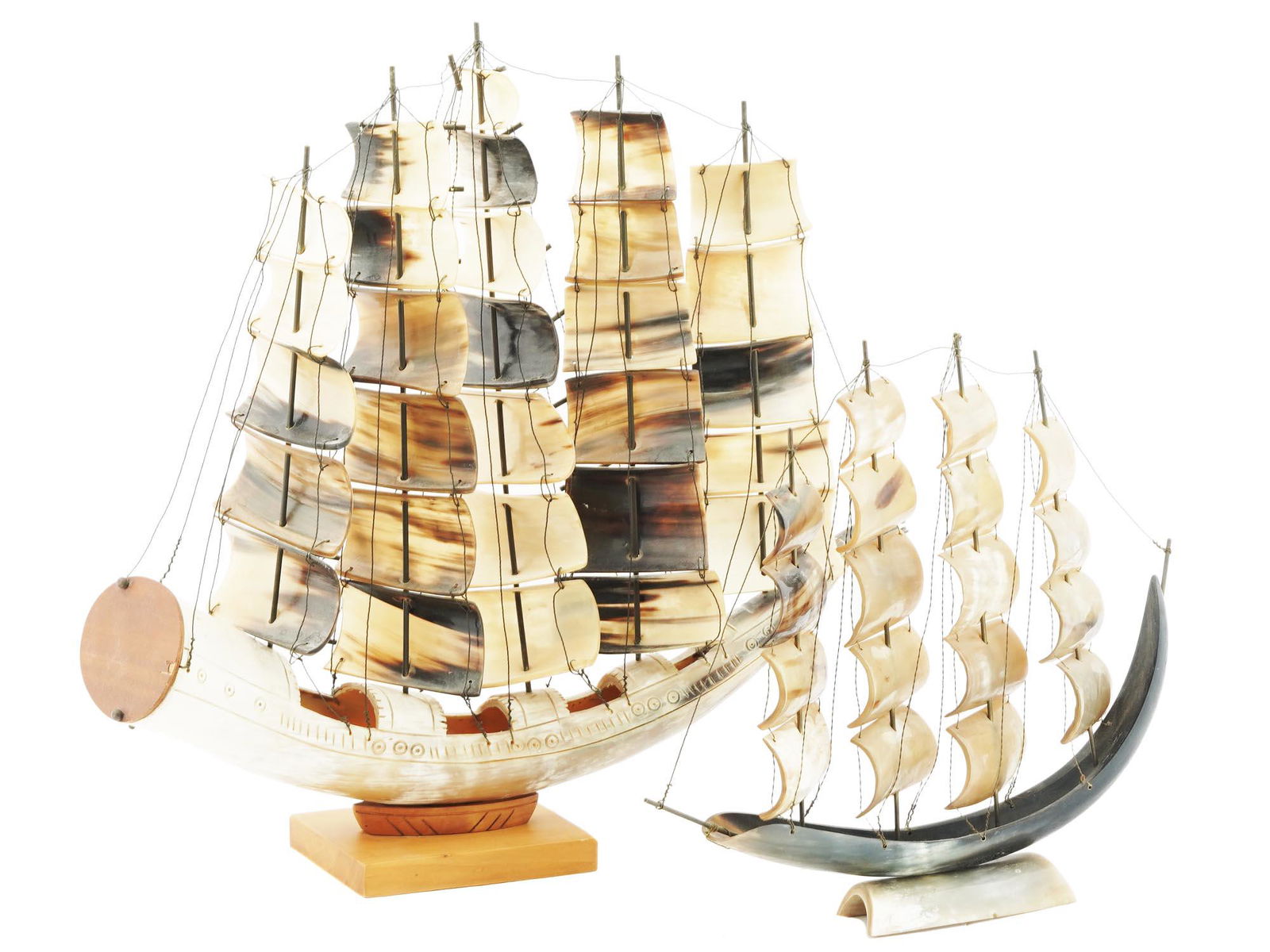 VINTAGE 1970S COW HORN SAILING SHIP MODELS: Two skillfully hand crafted vintage sailing ship models made from cow horn. Highly detailed and nicely preserved. Natural Material Carvings, Decorative Collectibles For Home Decor, Room Accents And Ac