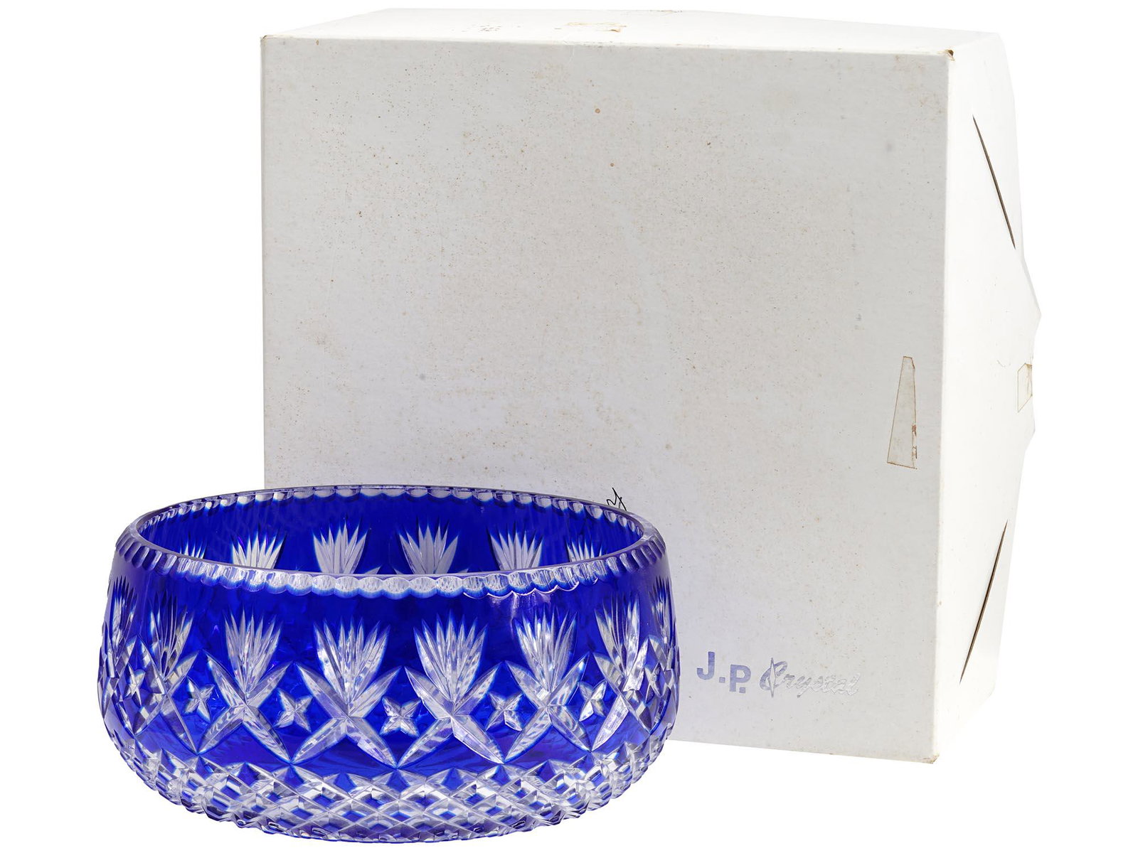 VINTAGE COBALT BLUE TO CLEAR CUT CRYSTAL BOWL: A fine vintage handcut 24 percent lead crystal bowl, presumably made in the Czech Republic circa the second half of the 20th century. Cut to clear cobalt blue crystal decorated with diamond and fan pa