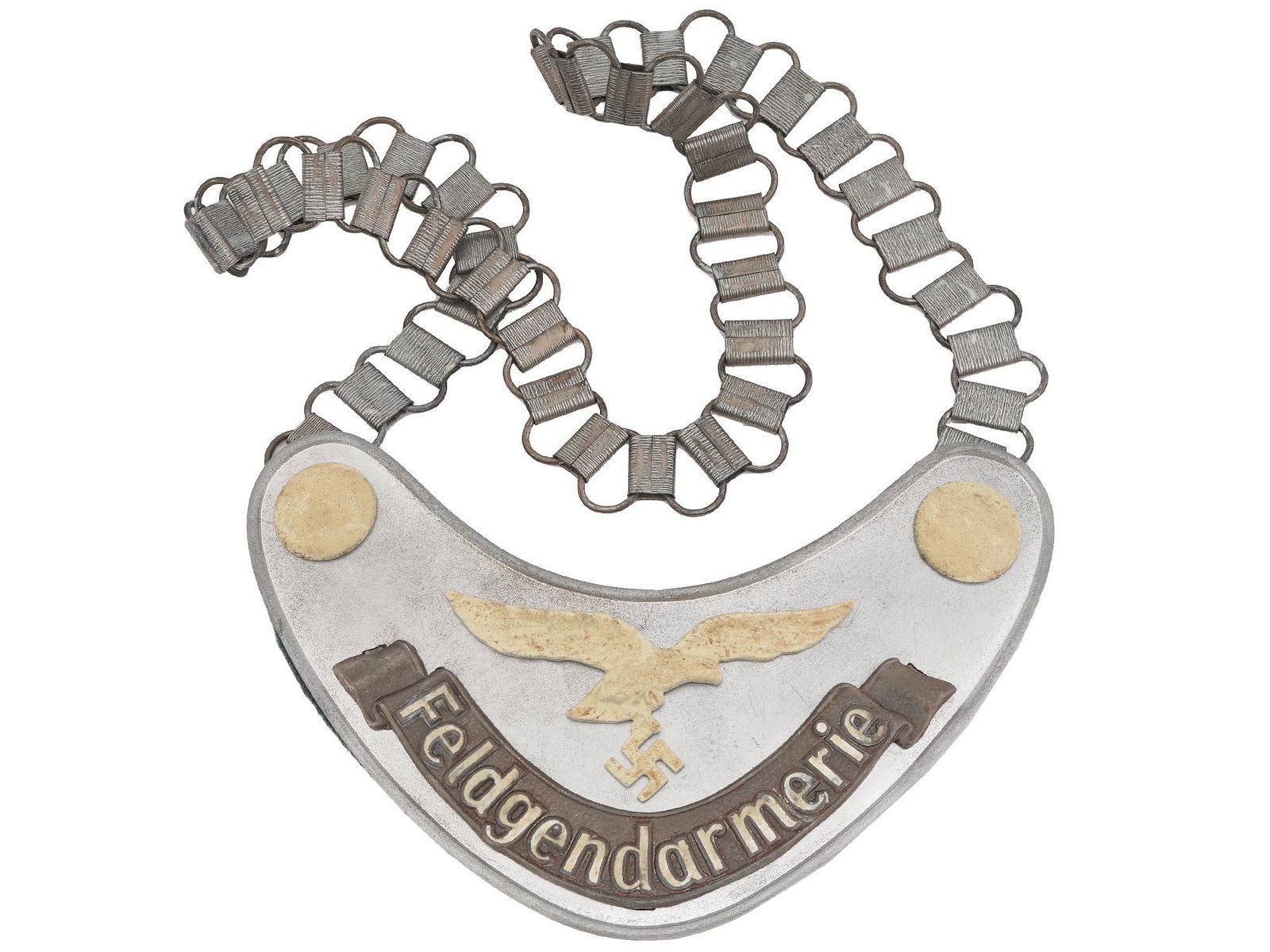 WWII NAZI GERMAN FIELD GENDARME GORGET W CHAIN: A World War II Nazi German military insignia, a field gendarmes gorget with chain. The item bears a golden eagle with a swastika and the inscription Feldgendarmerie. The Luftwaffe mark is on the backs