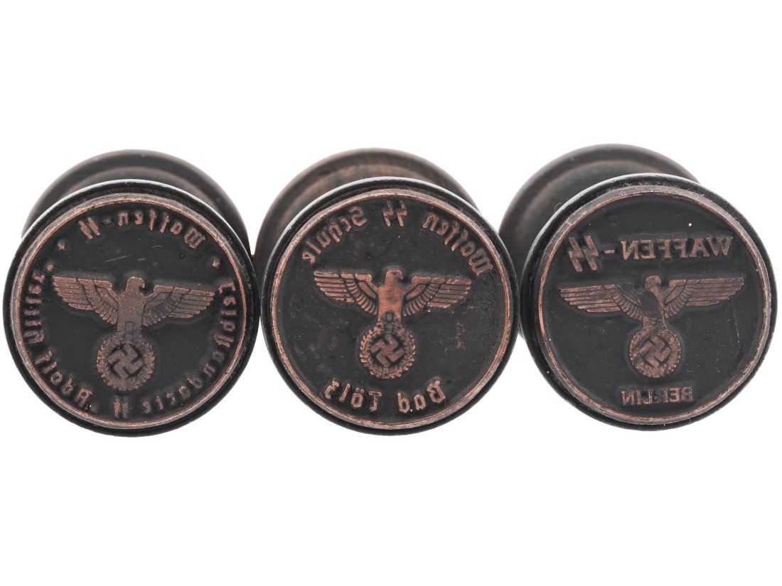 WWII NAZI GERMAN WAFFEN SS INK HAND STAMPS: A set of three WWII Nazi German Waffen SS wood and metal ink hand stamps including a stamp for the 1st SS Panzer Division Leibstandarte SS Adolf Hitler, a stamp for the SS Schule Bad TÃ¶lz, and a st