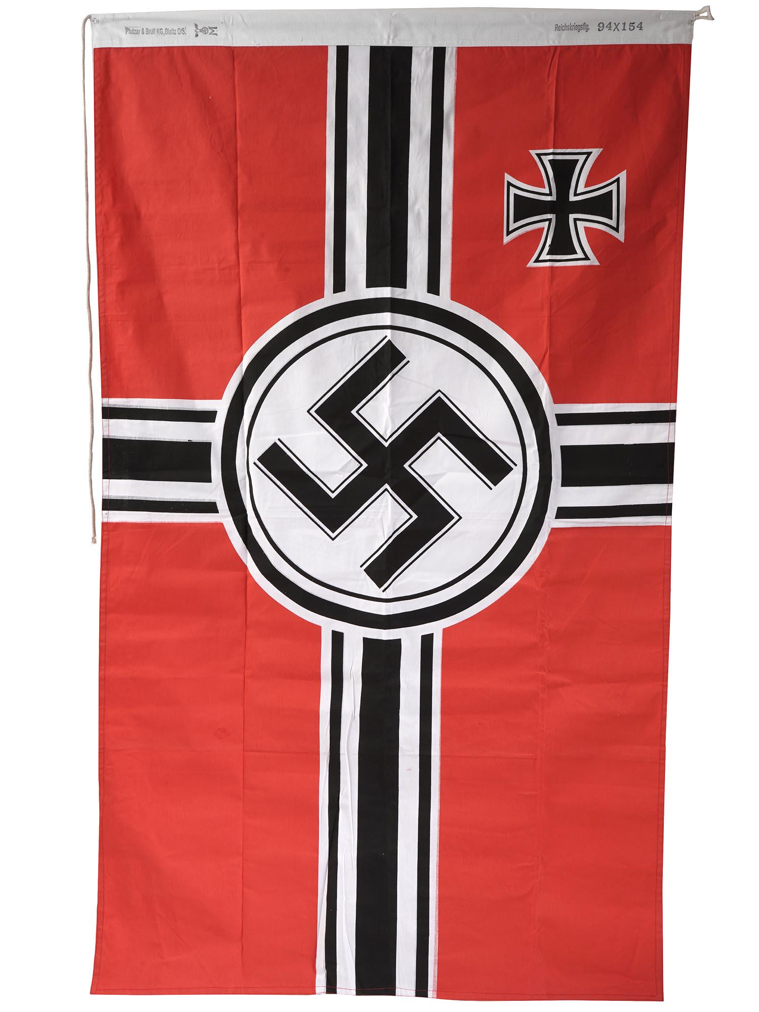 WWII NAZI GERMAN THIRD REICH COTTON WAR FLAG: A WWII Nazi German heavy cotton War Flag featuring the fusion of elements of the Nazi German Flag, such as a swastika and red background, with that of the old Imperial Reich War Flag with four arms em