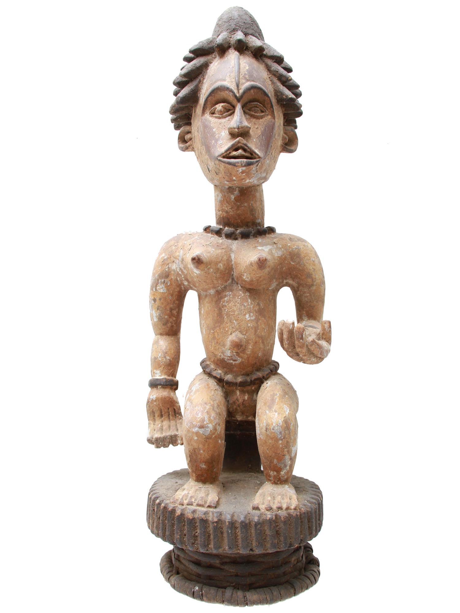 A VINTAGE AFRICAN CARVED SEATED FEMALE FIGURE (1 of 10)