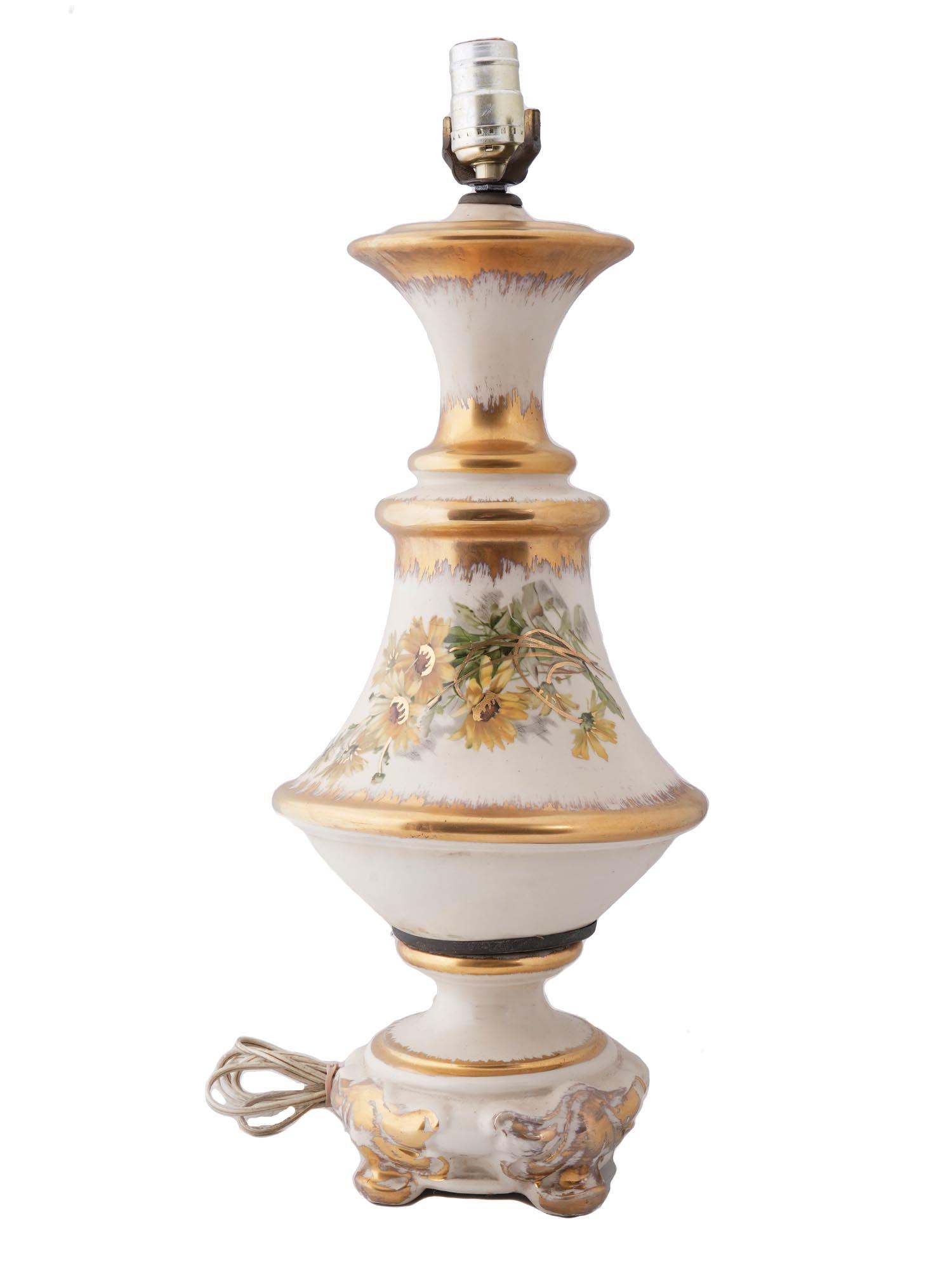 ANTIQUE 19TH C. BAVARIAN PORCELAIN TABLE LAMP: An antique porcelain table lamp in the Rococo style, dating from the second half of the 19th century. The porcelain body is hand painted with a bouquet of flowers and decorated with gilding. Possibly