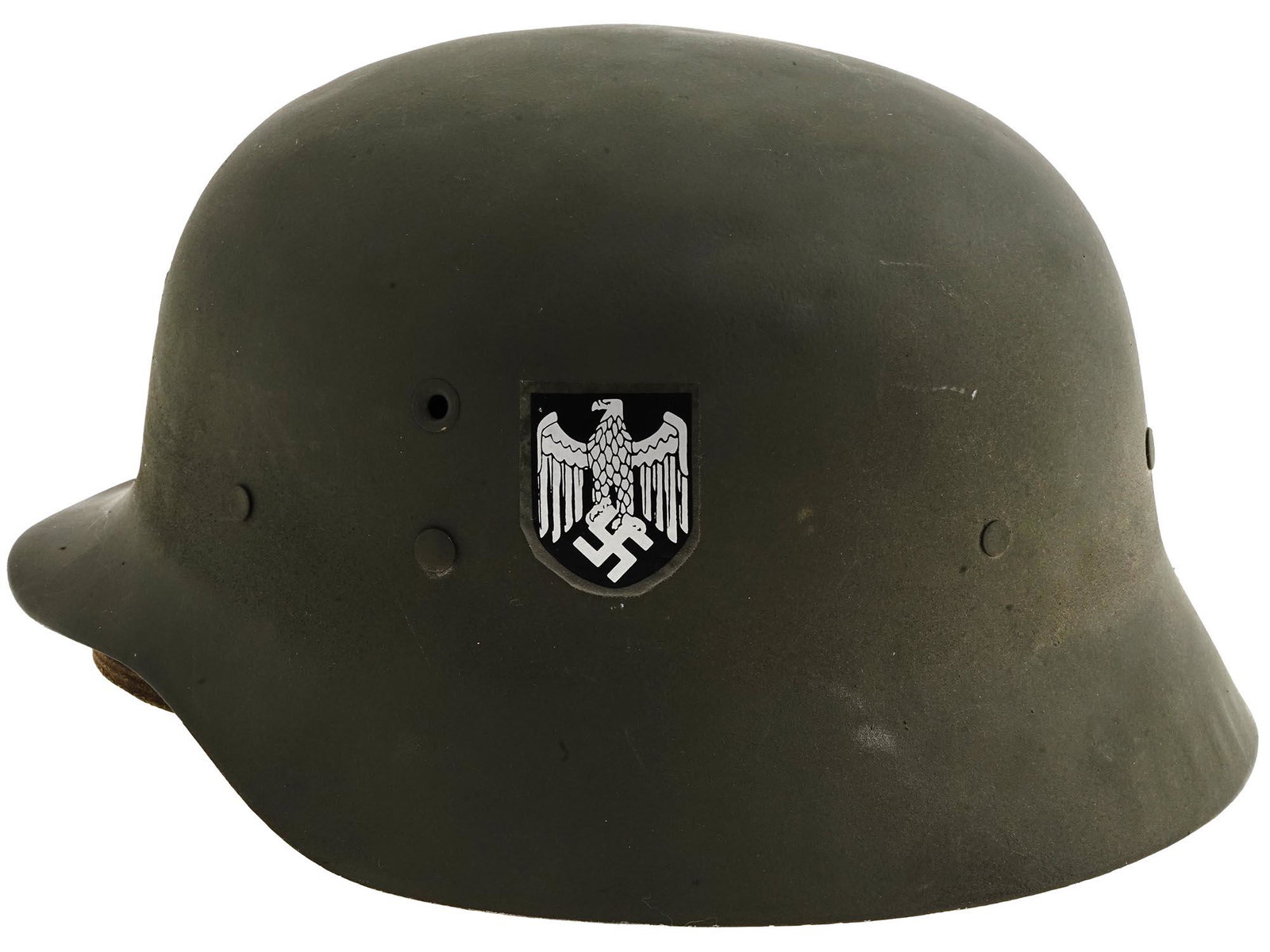 WWII GERMAN M35 STEEL HELMET WITH NAZI SYMBOLS: A German M35 double decal Polizei helmet with leather liner. The Stahlhelm is a German military steel combat helmet intended to provide protection against shrapnel and fragments of grenades. Polizei h