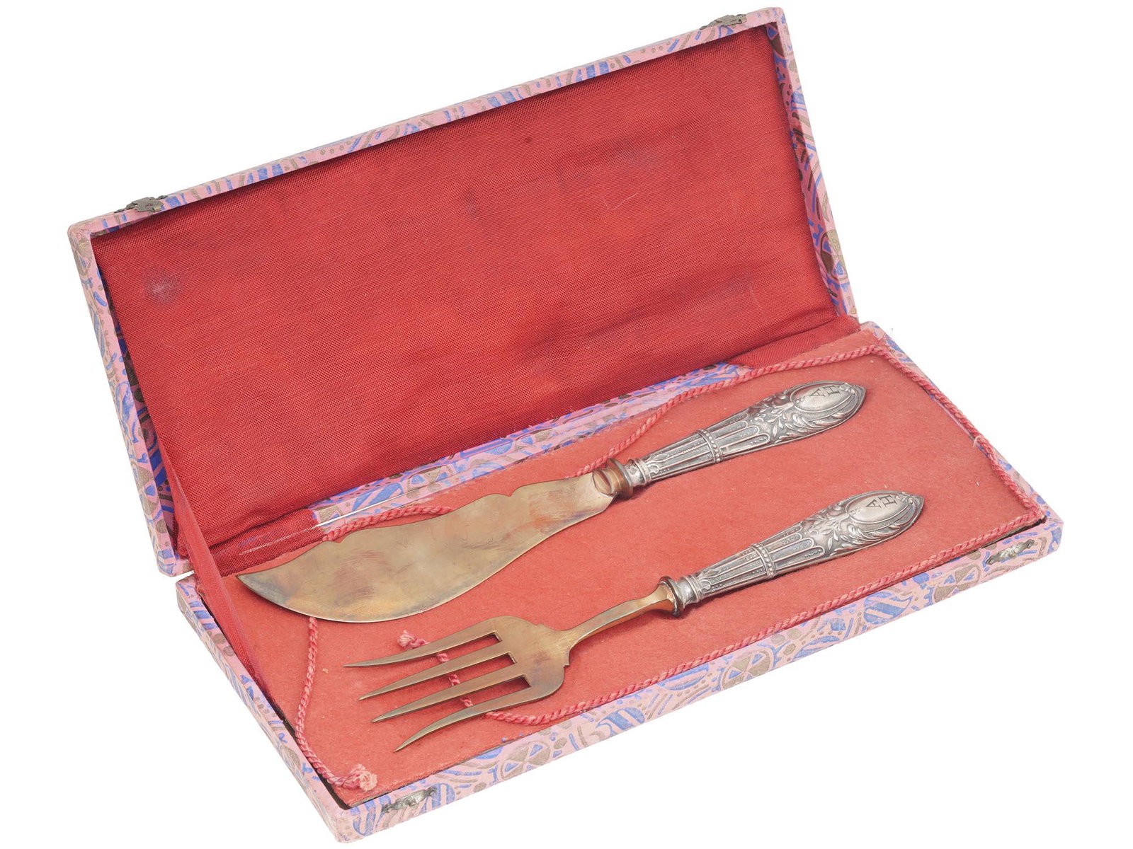 WWII ADOLF HITLER FISH CUTLERY SET IOB, 2 PCS: A World War II silverplated fish cutlery set, a fork and knife. The blades of the pieces are gilt. The embossed handles feature engraved AH initials referring to Adolf Hitler. Traces of silver hallmar
