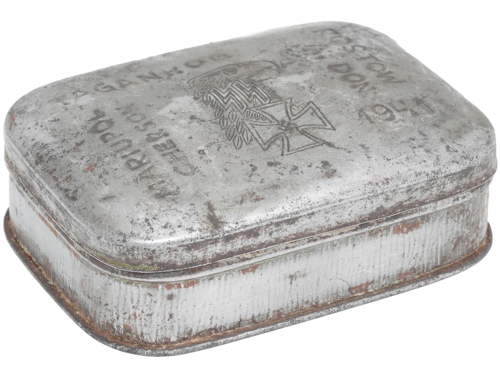 WWII GERMAN 1941 BATTLE OF AZOV SEA TRINKET BOX: A World War II German Waffen SS trench art, a steel trinket box with hinged lid decorated with handmade engraving. The lid depicts a Rechsadler, SS symbol and the Iron Cross with swastika encompassed 