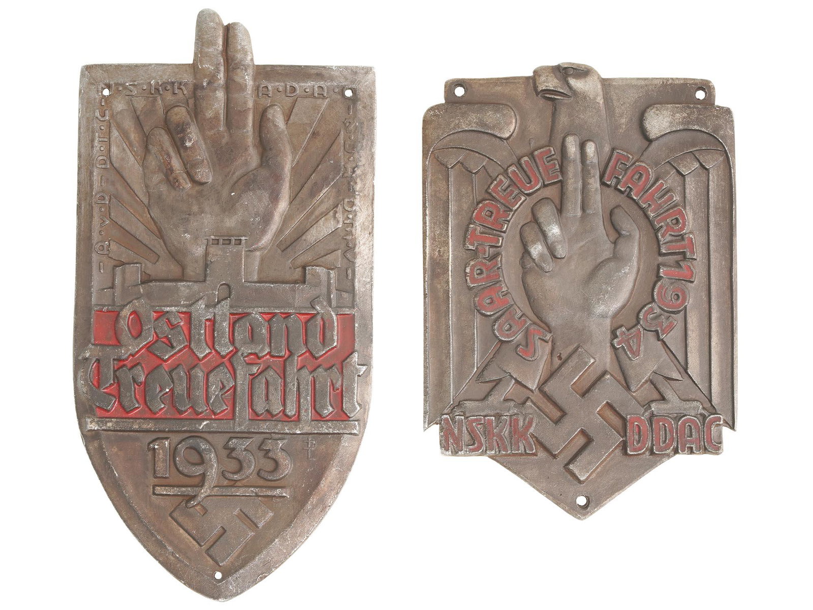 WWII ERA GERMAN THIRD REICH OSTLAND METAL PLAQUES: A pair of WWII German Nazi Third Reich National Socialist Motor Corps and German Automobile Association commemorative plaques for a driving event rally held in Ostland East Prussia in 1933, and 1934 N