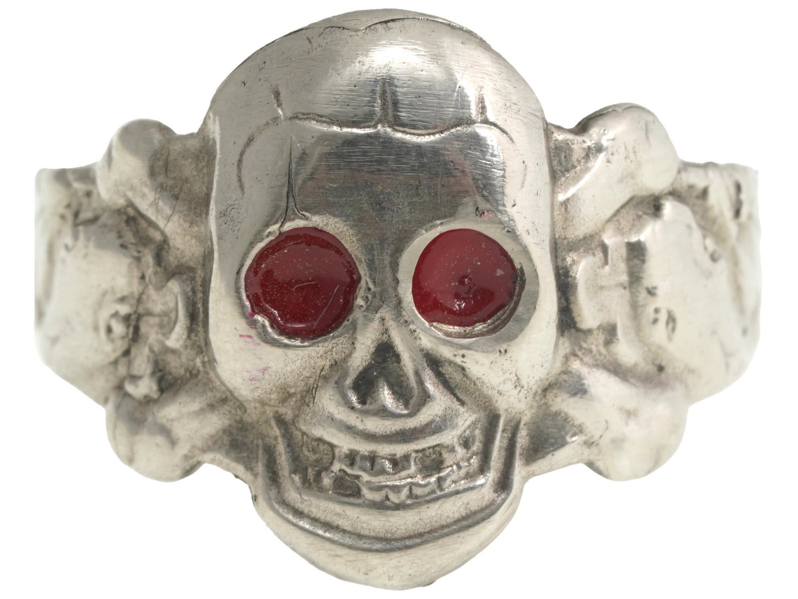 WWII NAZI GERMAN SS TOTENKOPF SKULL ENAMEL RING: A WWII German Nazi Third Reich Waffen SS Totenkopf division officers enamel ring. The ring is adorned with engraved patterns and a relief image of a skull, and a Totenkopf swastika insignia, and the e