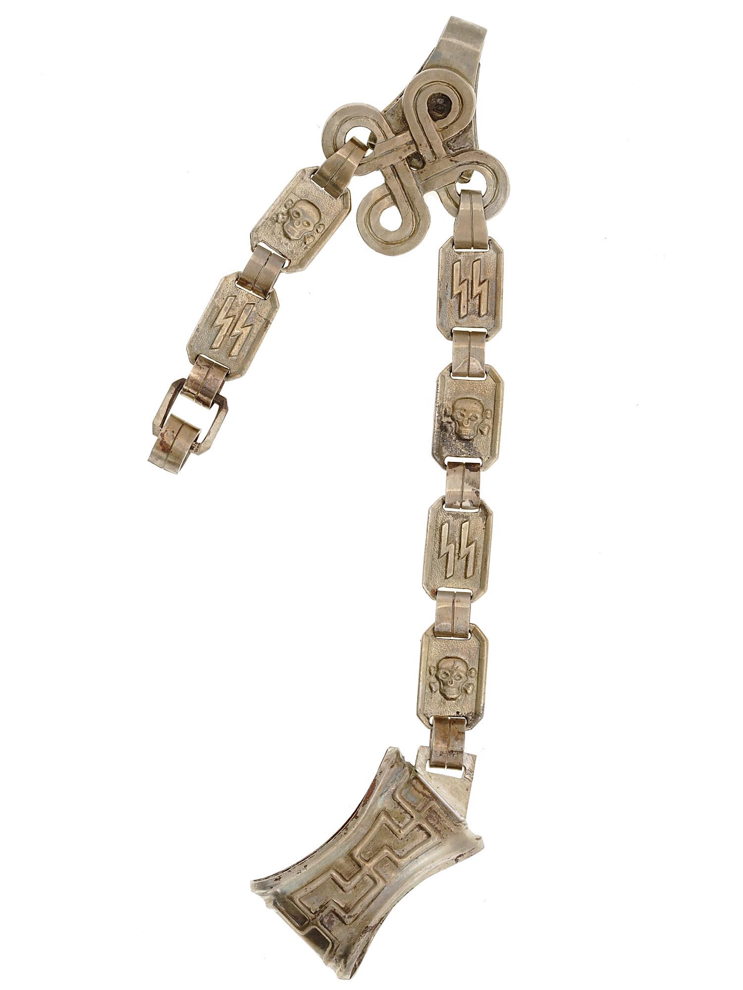 WWII NAZI GERMAN THIRD REICH HANGER FOR SS DAGGER: A German WWII hanger for SS dagger. The links feature SS and skull emblems. Marked: RZM. Second World War German Militaria And War Memorabilia Collectibles. Dimensions: Size: 9 1/2 in. All measurement