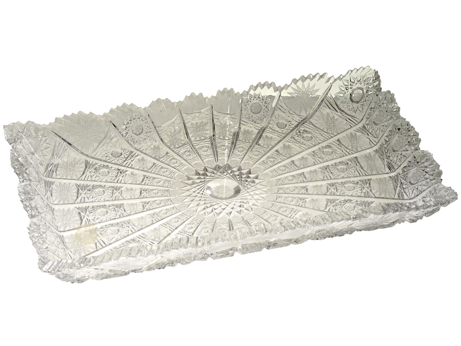 VINTAGE BOHEMIAN HAND CUT CRYSTAL SERVING TRAY: A vintage Bohemian crystal serving tray with hand cut hobstar design. The rectangular tray has raised borders. Collectible Cut Glass Tableware And Serveware. Dimensions: 11 3/4 x 7 in. All measurement