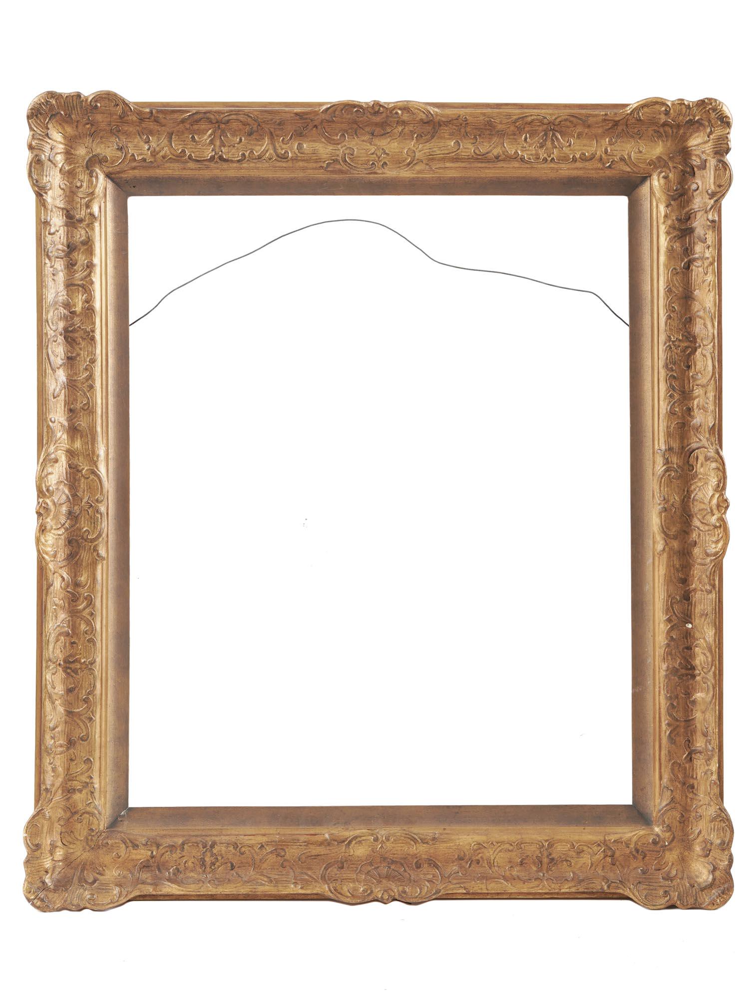 ANTIQUE EUROPEAN SCHOOL GOLD PATINATED WOOD FRAME: An antique European school gold patinated wooden frame The frame is made in relief gold leaf and scrollwork designs. Circa: early 20th century. Antique, Vintage, Mid century Gilt Wood Frames, Wall Art