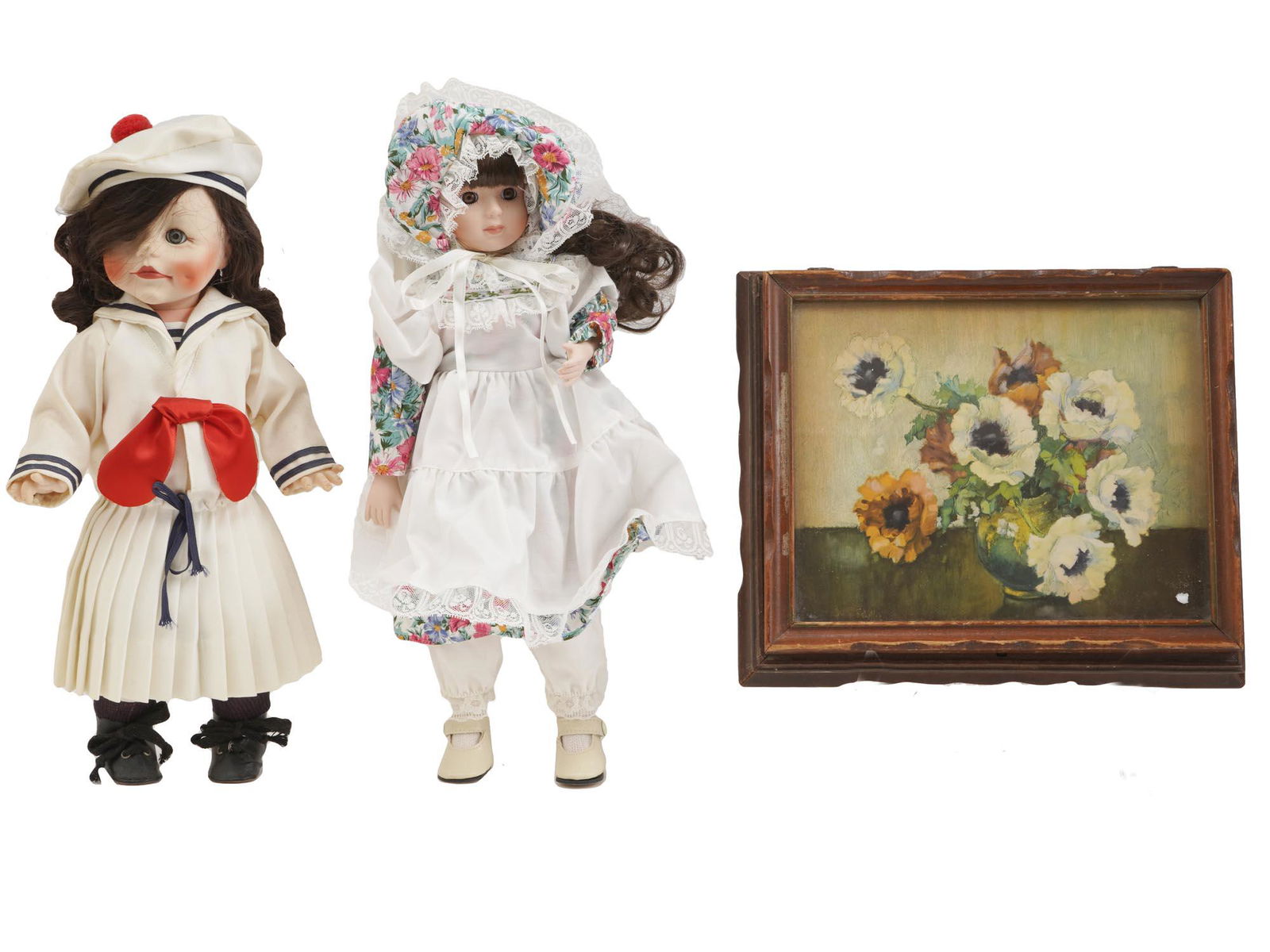 COLLECTION OF LARGE PORCELAIN DOLL AND CASKET BOX: A collection of two large dolls and a casket box. The collection includes a porcelain doll dressed in a costume with a floral print; a sailor doll by Effanbee Company produced composition, hard rubber