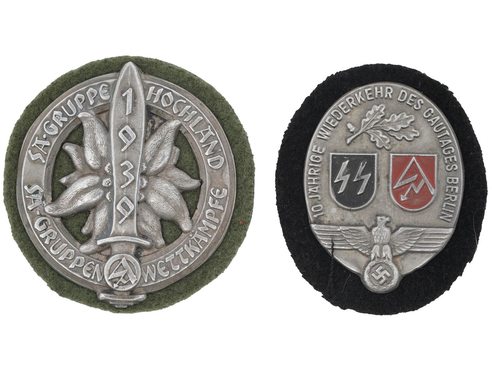WII NAZI GERMAN SA HOCHLAND GAUGES BERLIN SHIELDS: A pair of WWII Nazi German Third Reich enamel metal shields. The first: is SA Gruppe Hochland Rally, decorated with a relief image of an Edelweiss flower, sword, and a SA logo surrounded by the text. 