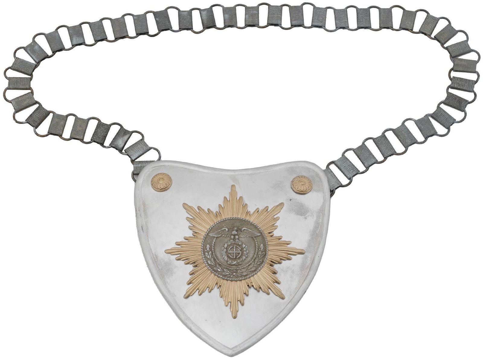 WWII NAZI GERMAN SA FLAG BEARER GORGET WITH CHAIN: A WWII Nazi German stamped brass construction heart shaped gorget featuring a large tombak eight point sunburst pattern plate affixed to the center with a silver plated circular plate superimposed to
