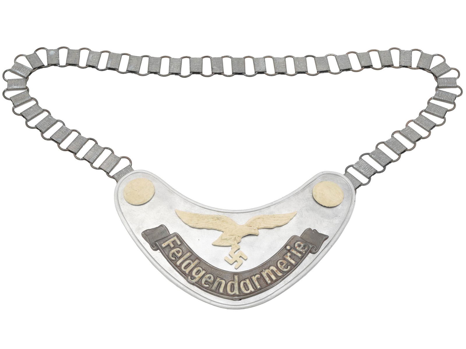 WW2 GERMAN LUFTWAFFE MILITARY FIELD POLICE GORGET: A WWII Nazi German Luftwaffe Military Field Police Feldgendarmerie gorget of a die stamped steel construction aluminum coated, while the Luftwaffe eagle with a swastika and buttons are painted with ra