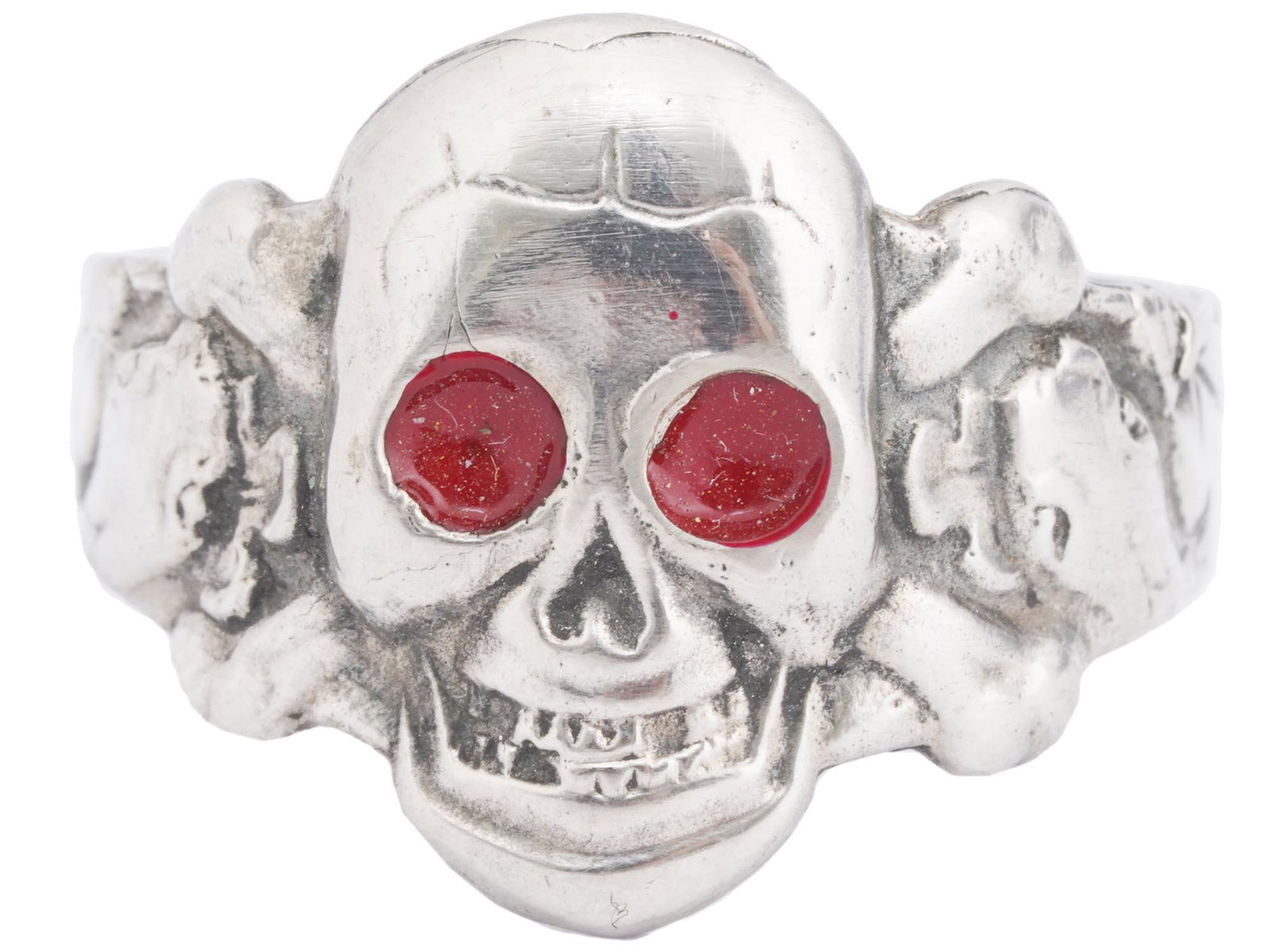 WWII NAZI GERMAN SS TOTENKOPF ENAMEL SILVER RING: A WWII German Nazi Third Reich Waffen SS Totenkopf division officers silver ring. The ring is adorned with engraved patterns and a relief image of a skull, a Totenkopf swastika insignia, and covered w