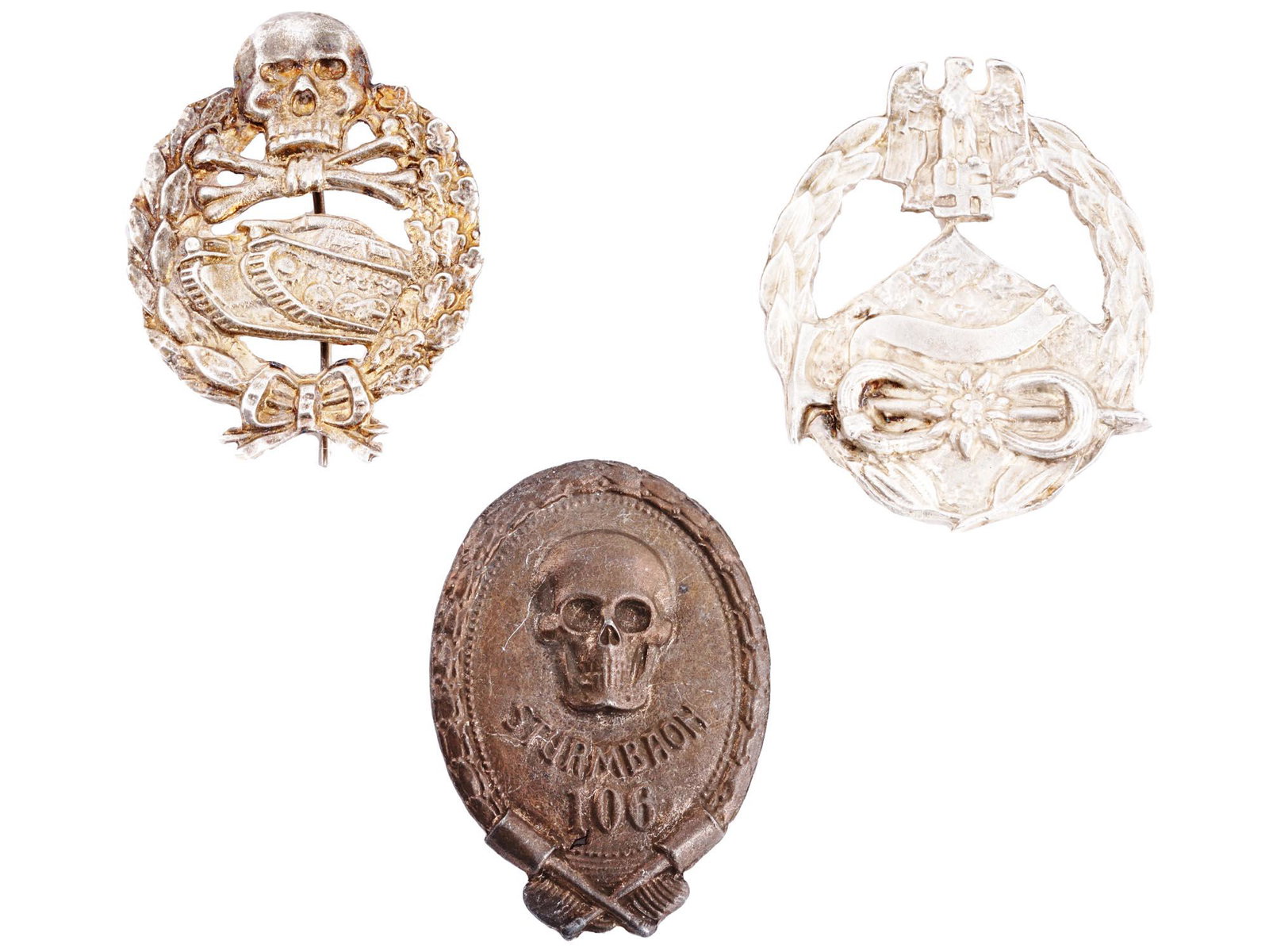 GERMAN WW1 AND NAZI WWII ERA MILITARY BADGES: Two German Imperial WW1 military badges including a Panzer badge and a stormtrooper badge, and a Nazi German WWII army mountain troops badge badges including a Panzer badge. Hallmarked. With pinbacks 