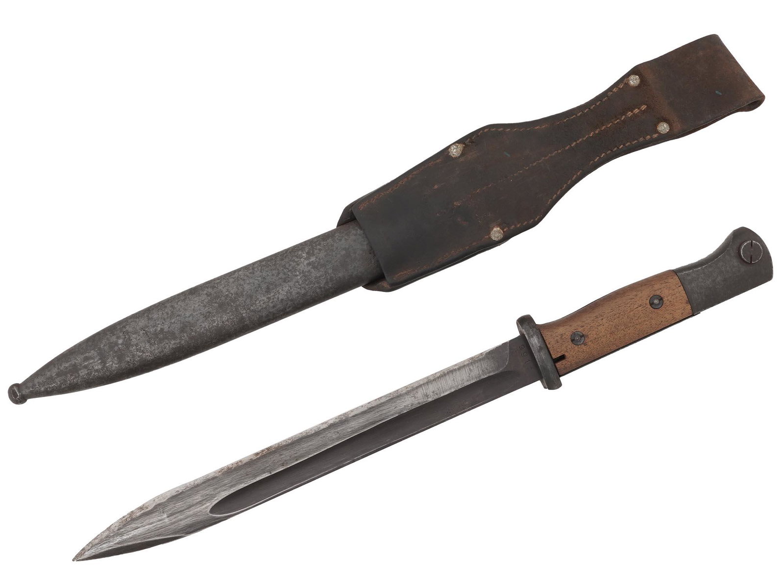 WWII NAZI GERMAN BAYONET K 98 IN SHEATH: A World War II German bayonet K-98. Stainless steel blade, oval crossguard, wooden handle. Leather and steel sheath. Traces of a hallmark and number 995 are embossed on the blade by the crossguard. Se