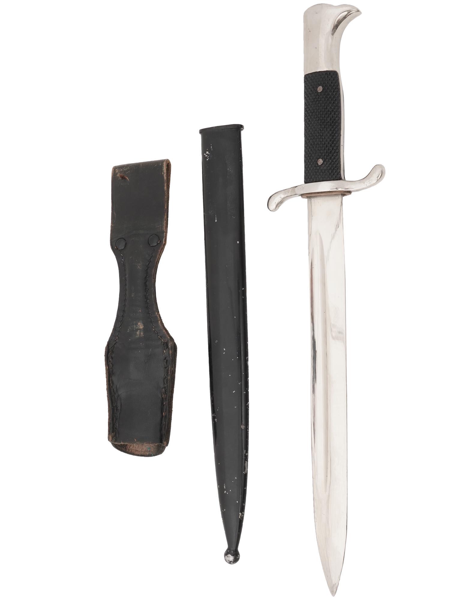 WWII NAZI GERMAN BAYONET IN SHEATH: A World War II German bayonet. Stainless steel blade, black bakelite handle. Leather sheath. The combat knives became a favorite war souvenir for the allies. Second World War Historical Collectables A