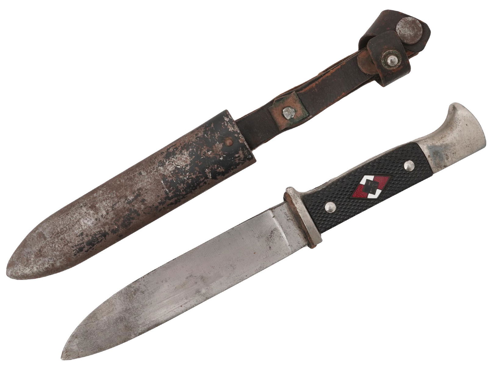 WWII NAZI GERMAN HITLER YOUTH DAGGER W SCABBARD: A WWII Nazi German Third Reich Hitler Youth member dagger. Completed with an original magnetic sheet metal scabbard. The knife has molded, black bakelite grips with an enameled rhomboid swastika insig