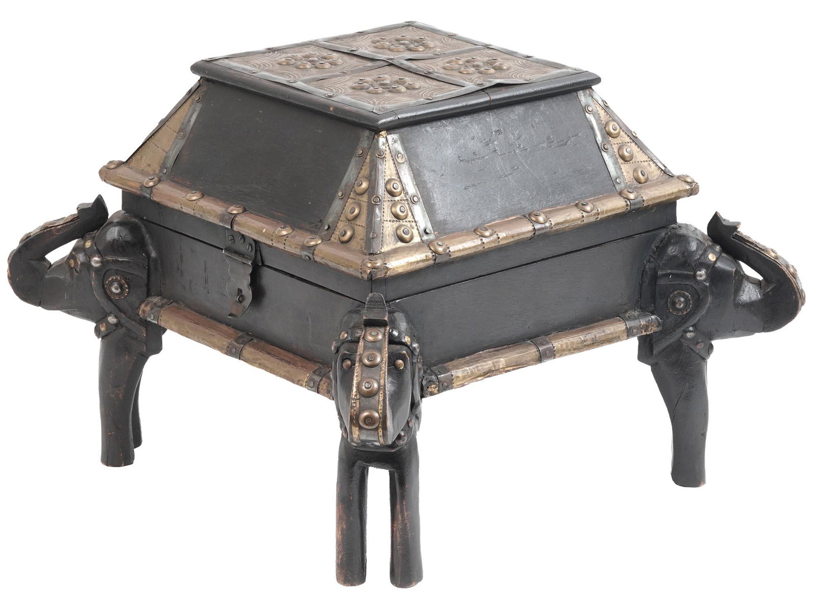ANTIQUE 19TH C INDIAN CASKET WITH ELEPHANT FEET: A fine and rare antique Indian casket made of black painted wood, having a pyramidal lid above a rectangular body with a brass lock and decorative mounts, raised on four hand carved feet modeled as el