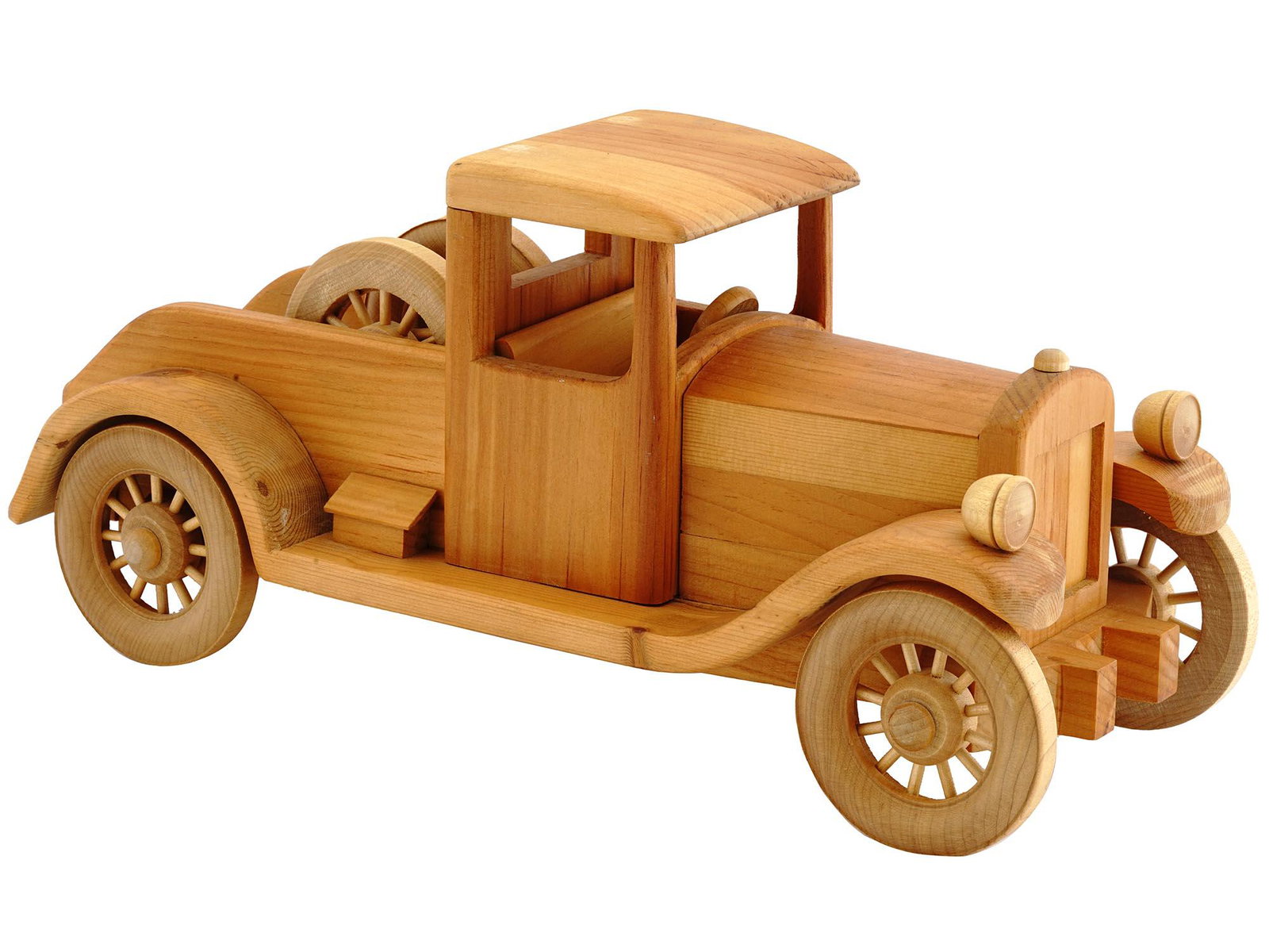 VINTAGE AMERICAN EARL SPADE WOODEN TRUCK CAR: A vintage American wooden truck model car handcrafted by Earl Spade featuring fine cut details. Marked underneath. Circa the 1930s. Antique And Vintage Wooden Models And Toy Car Collectibles. Dimensio