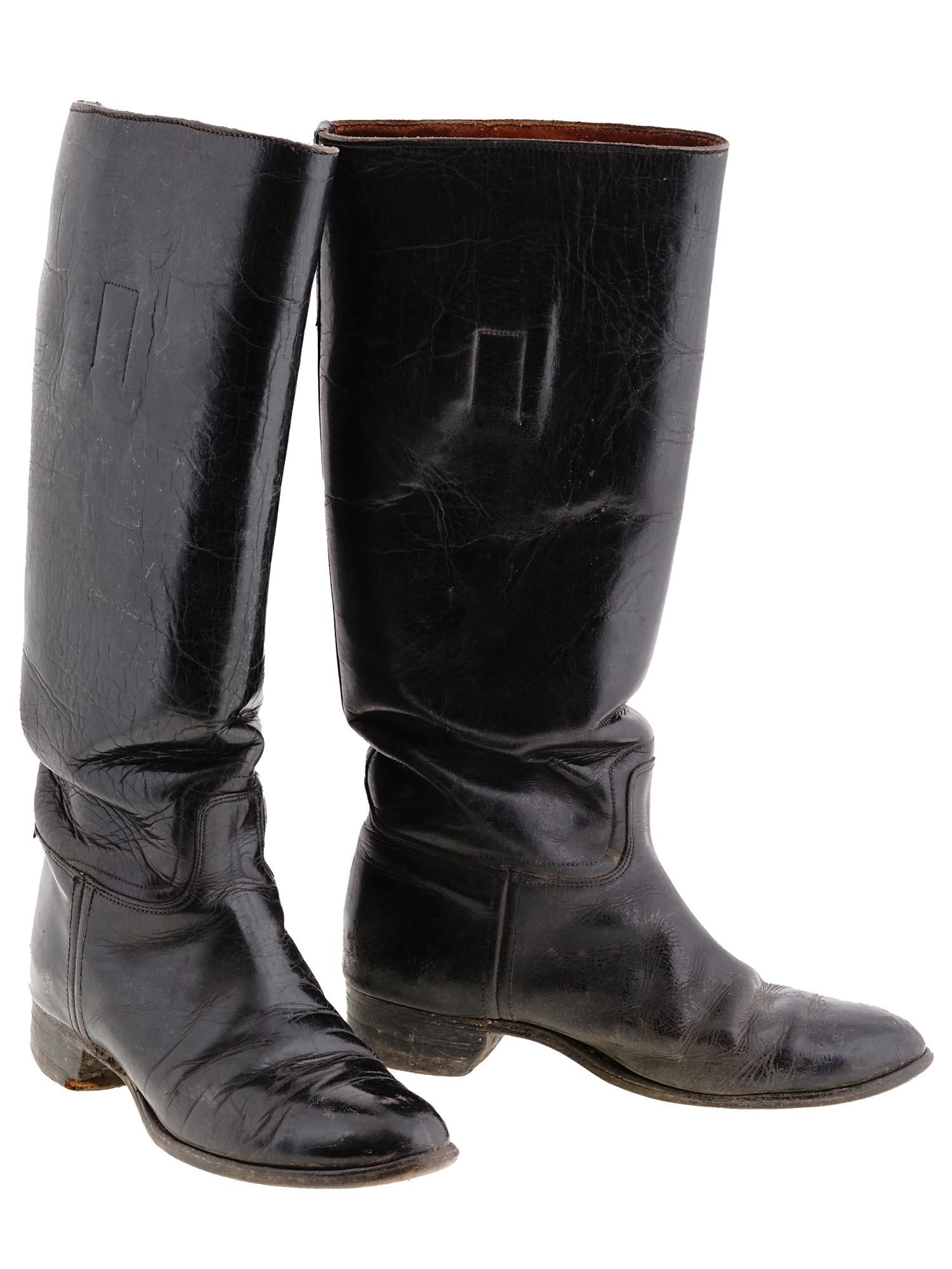 VINTAGE PAIR OF WOMENS LEATHER RIDING BOOTS: A pair of vintage black leather riding boots for women. Vintage Fashion Accessories And Vanity Items, Sports Equipment For Women. Dimensions: Size: 9 x 15 in. All measurements are approximate.
