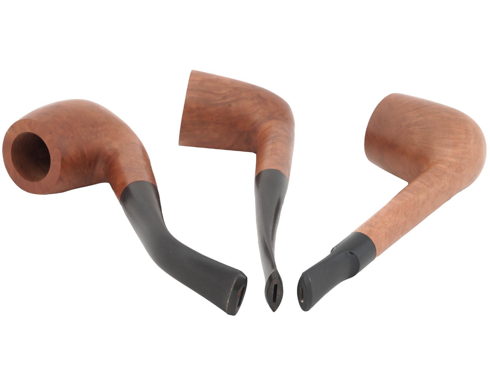 GROUP OF FRENCH HAND CARVED WOODEN TOBACCO PIPES: A collection of three French hand carved wooden tobacco pipes. The pipes are marked with imprssed stamps, Saint Claude Bruyere Garantie B. M. F., Sublime. Provenance: The personal collection of George