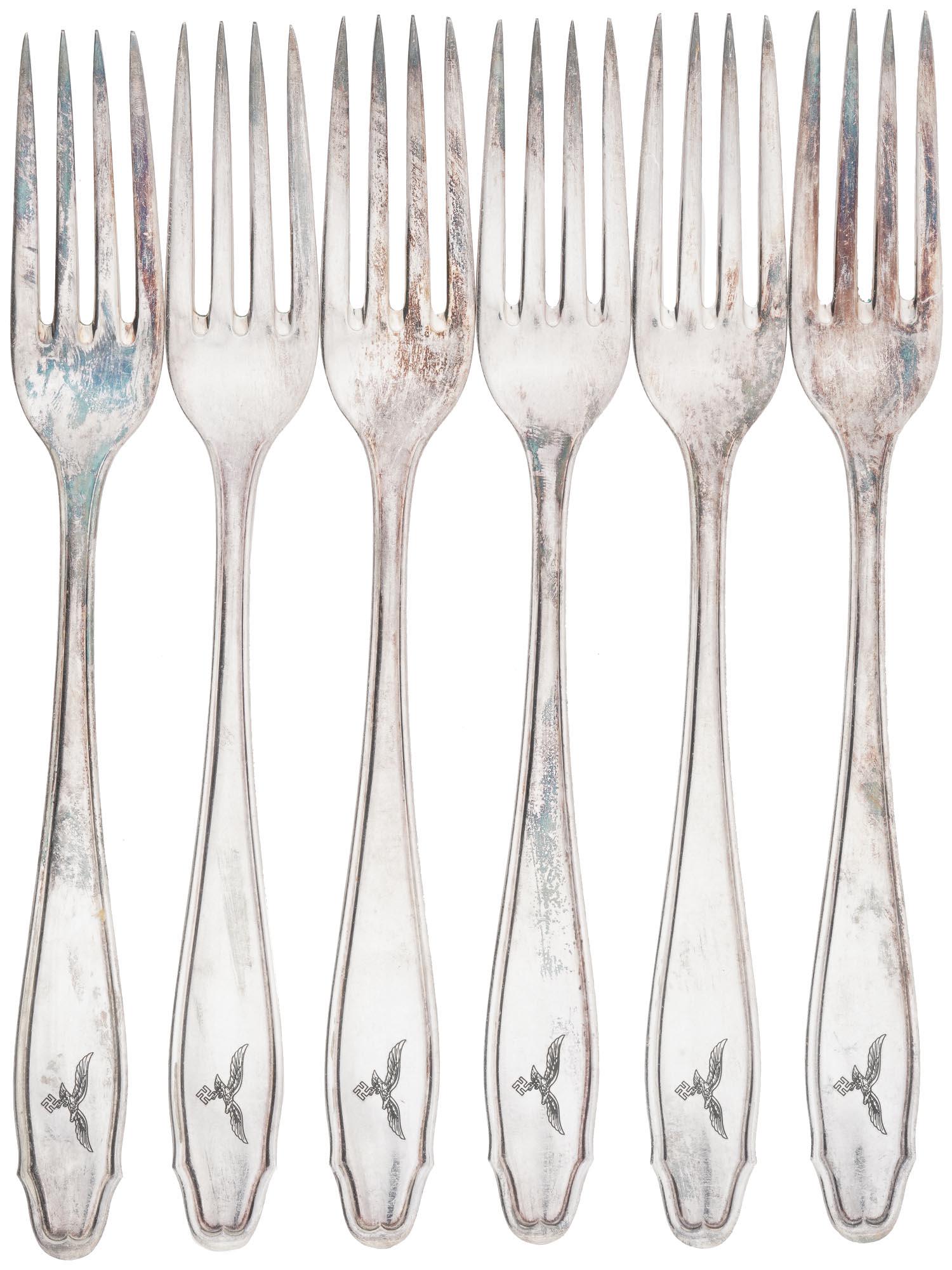 WWII NAZI GERMAN LUFTWAFFE CANTEEN FORKS, 6 PCS: A set of World War II stainless steel forks from the Luftwaffe pilots canteen. A total of 6 items. Each fork has an etched Reichsadler on the handle. Marked GR 90 45 on the backside of each piece. Wor