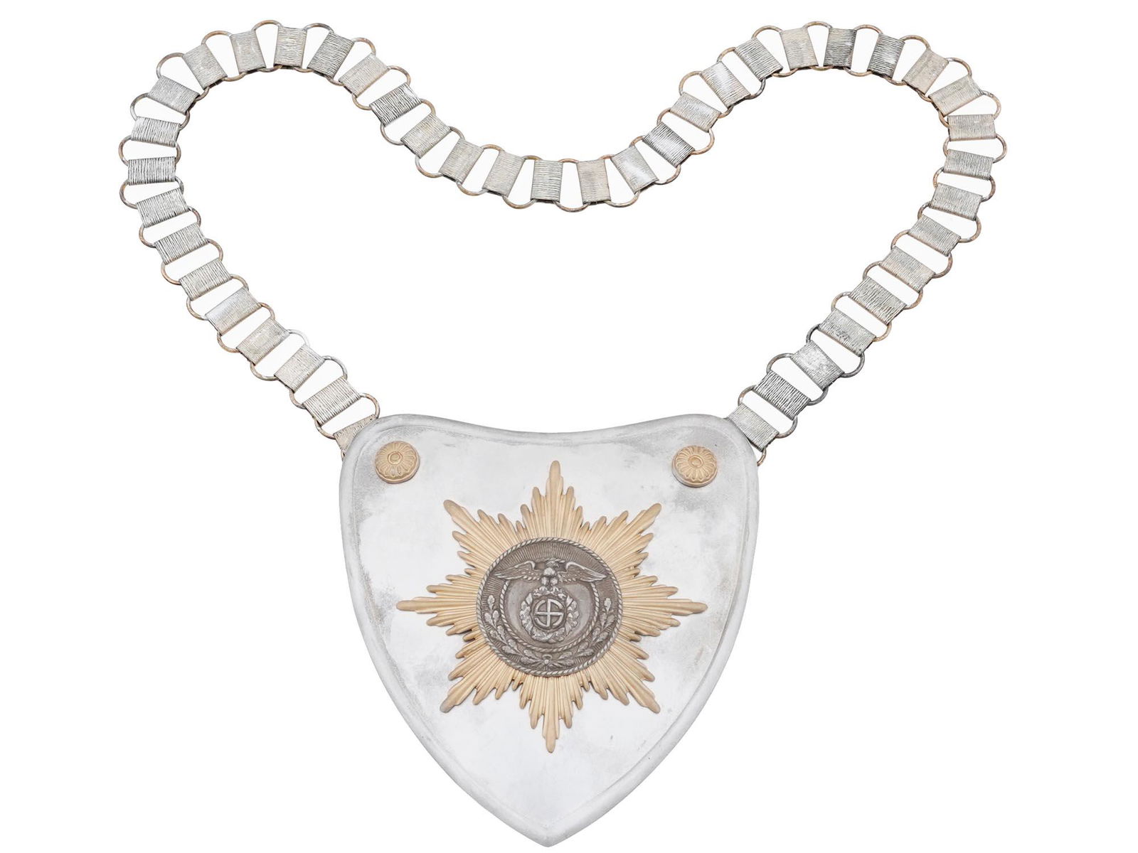WWII NAZI GERMAN SA FLAG BEARER GORGET WITH CHAIN: A WWII Nazi German stamped brass construction heart shaped gorget. The gorget features a large tombak eight point sunburst pattern plate affixed to the center with a silver plated circular plate super