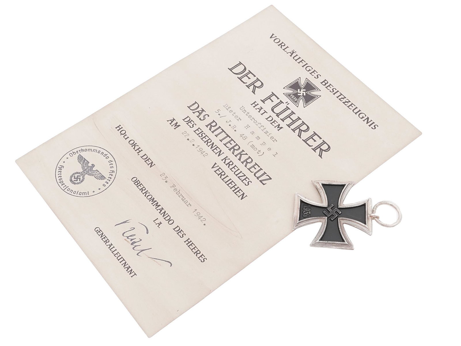 WWII NAZI GERMAN IRON CROSS 2ND CLASS WITH DOCS: A WWII Nazi German Iron Cross, 2nd Class, featuring a pattee cross with a single piece iron core and a solid silvered metal plate, the obverse of the award features an embossed, central, canted swasti