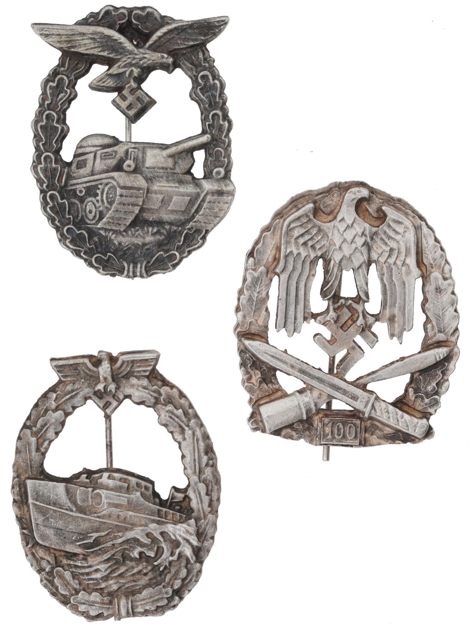 WWII NAZI GERMAN MILITARY ASSAULT BADGES, 3 PCS: A lot of World War II Nazi German military decorations. A total of 3 award badges: Army General Assault badge for participating in 100 assaults, Kriegsmarine E-Boat, Luftwaffe Tank Assault. Second Wor