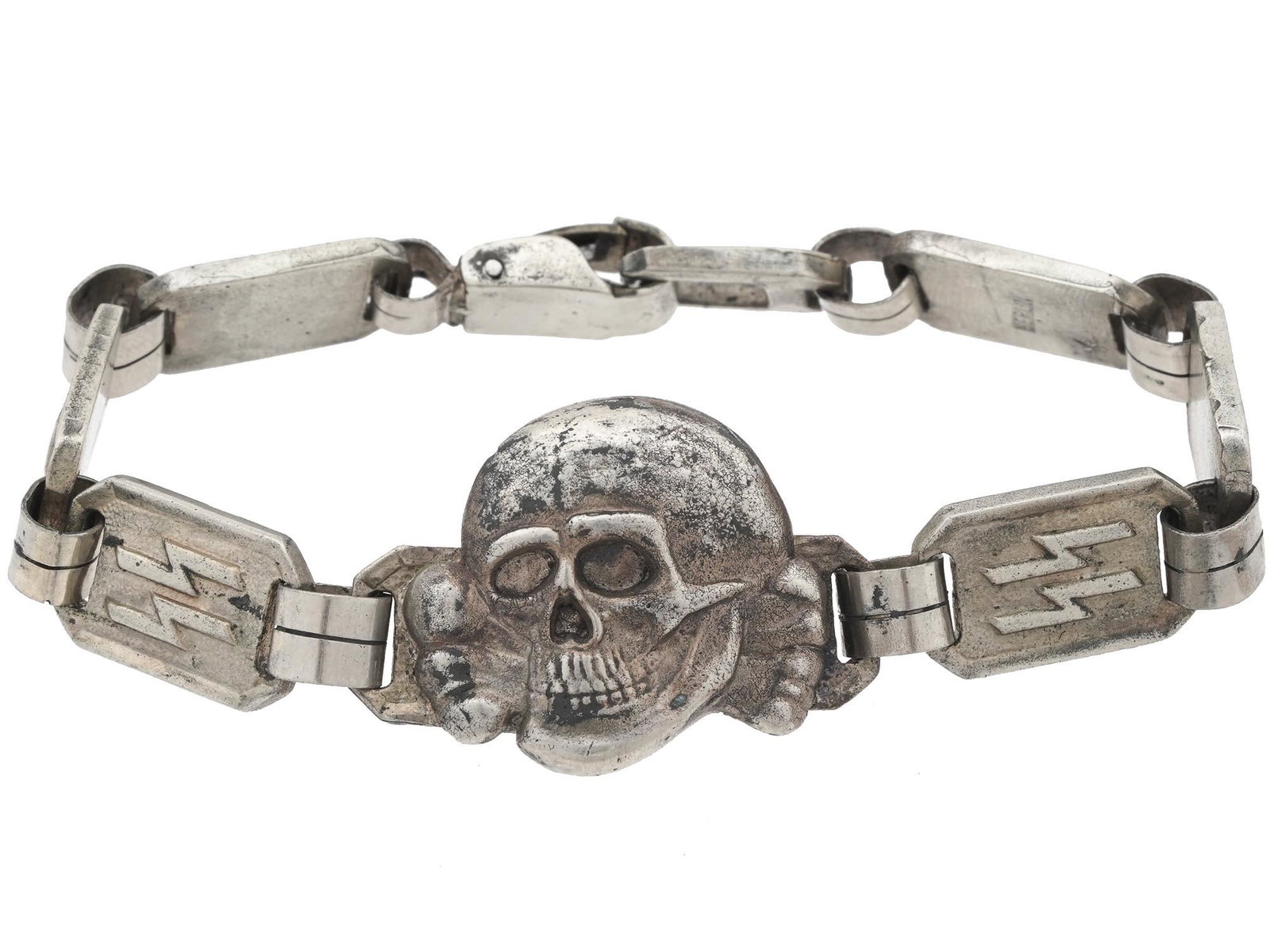 WWII NAZI GERMAN WAFFEN SS TOTENKOPF BRACELET: A WWII Nazi German Waffen SS steel nickel plated bracelet manufactured in a link design. The links are decorated with relief images of Totenkopf skulls and SS runes. The central link represents the re