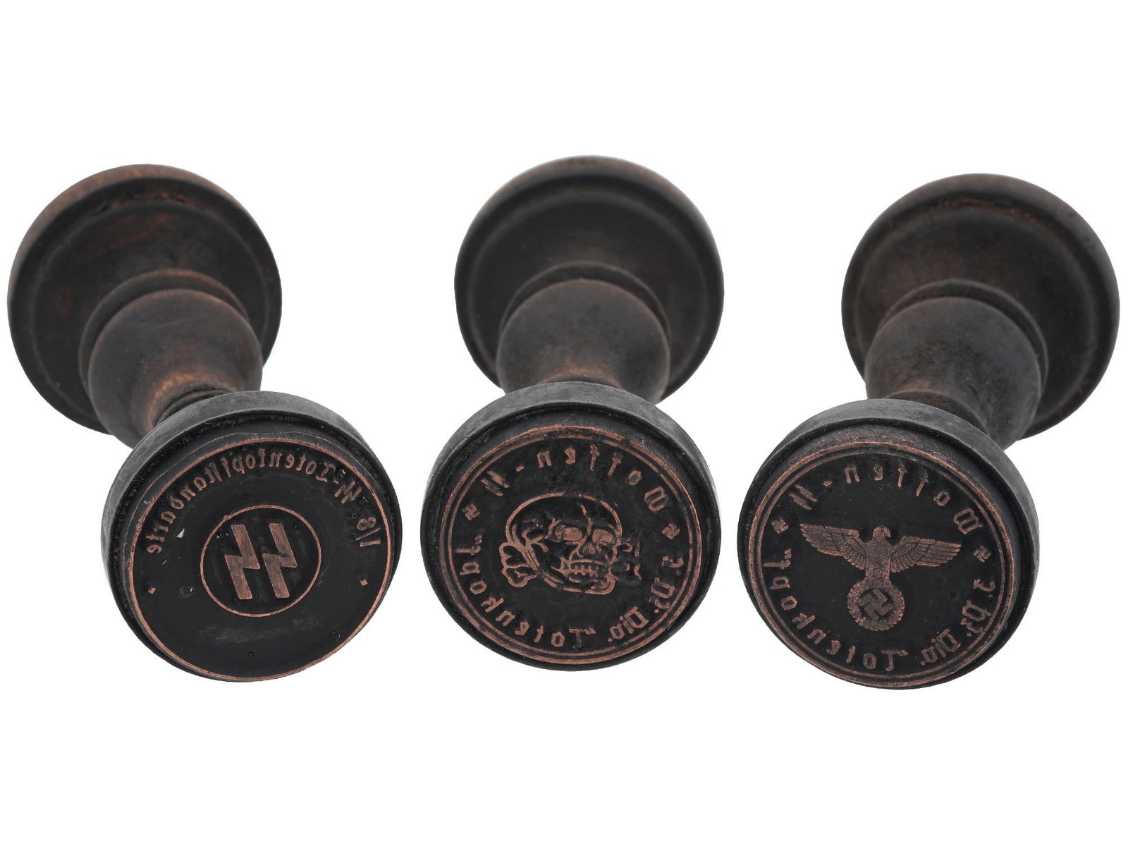 WWII GERMAN WAFFEN SS TOTENKOPF HAND STAMPS 3 PCS: A lot of three World War II Nazi German administrative wooden seals of the 3rd SS Panzer Division Totenkopf. The Schutzstaffel, or SS, was a major military organization in Nazi Germany responsible for