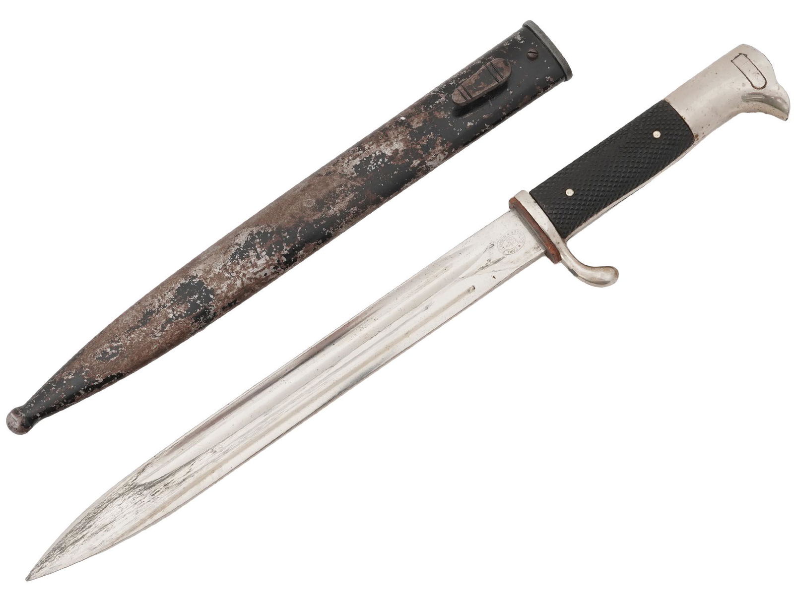 WWII NAZI GERMAN CLOSE COMBAT KNIFE IN SHEATH: A World War II German close combat knife, the Nahkampfmesser. Stainless-steel blade, black bakelite handle. Steel scabbard. Carl Eickhorn Solingen hallmark is on the blade by the handle. The German co