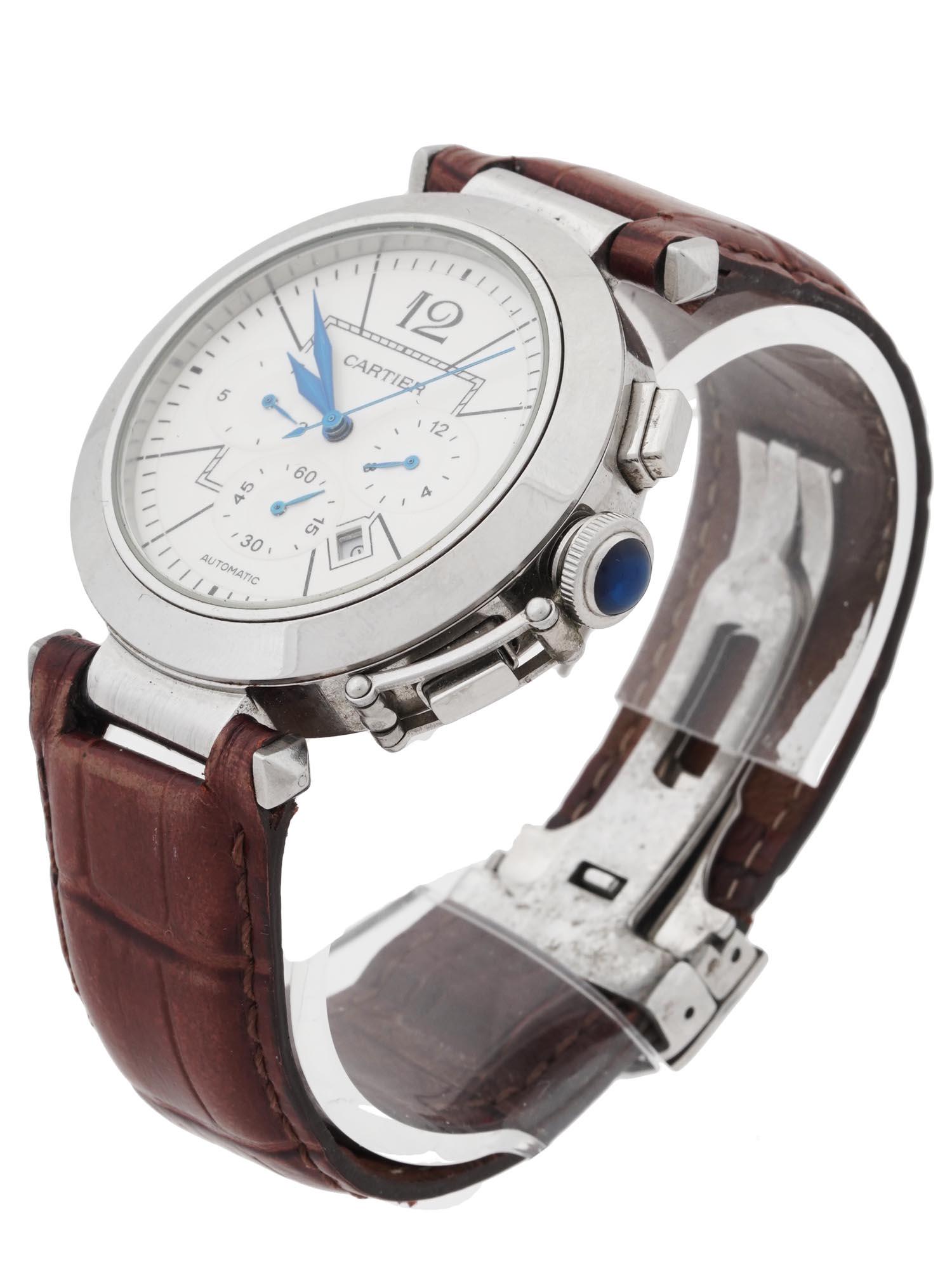 WATER RESISTANT WRIST WATCH WITH LEATHER BRACELET: A Water Resistant 100 m stainless steel wristwatch. A white enameled dial with black Arabic numerals with blue tone hands. Marked with a brand logo on the dial. Completed with a brown leather bracelet